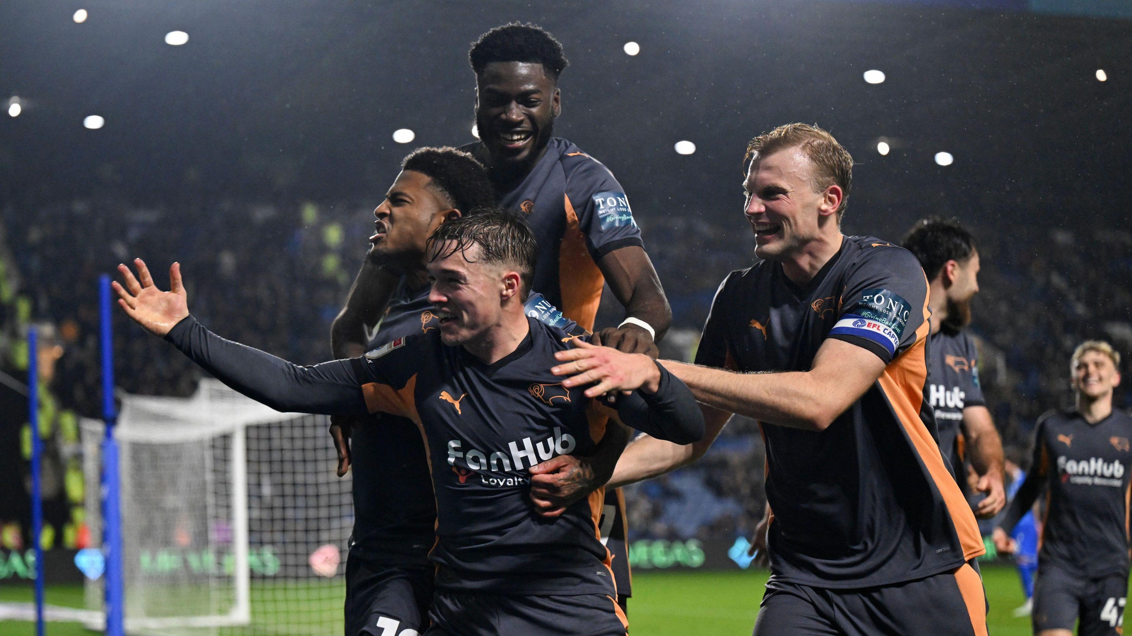 Liam Thompson celebrating his goal with his Derby County teammates