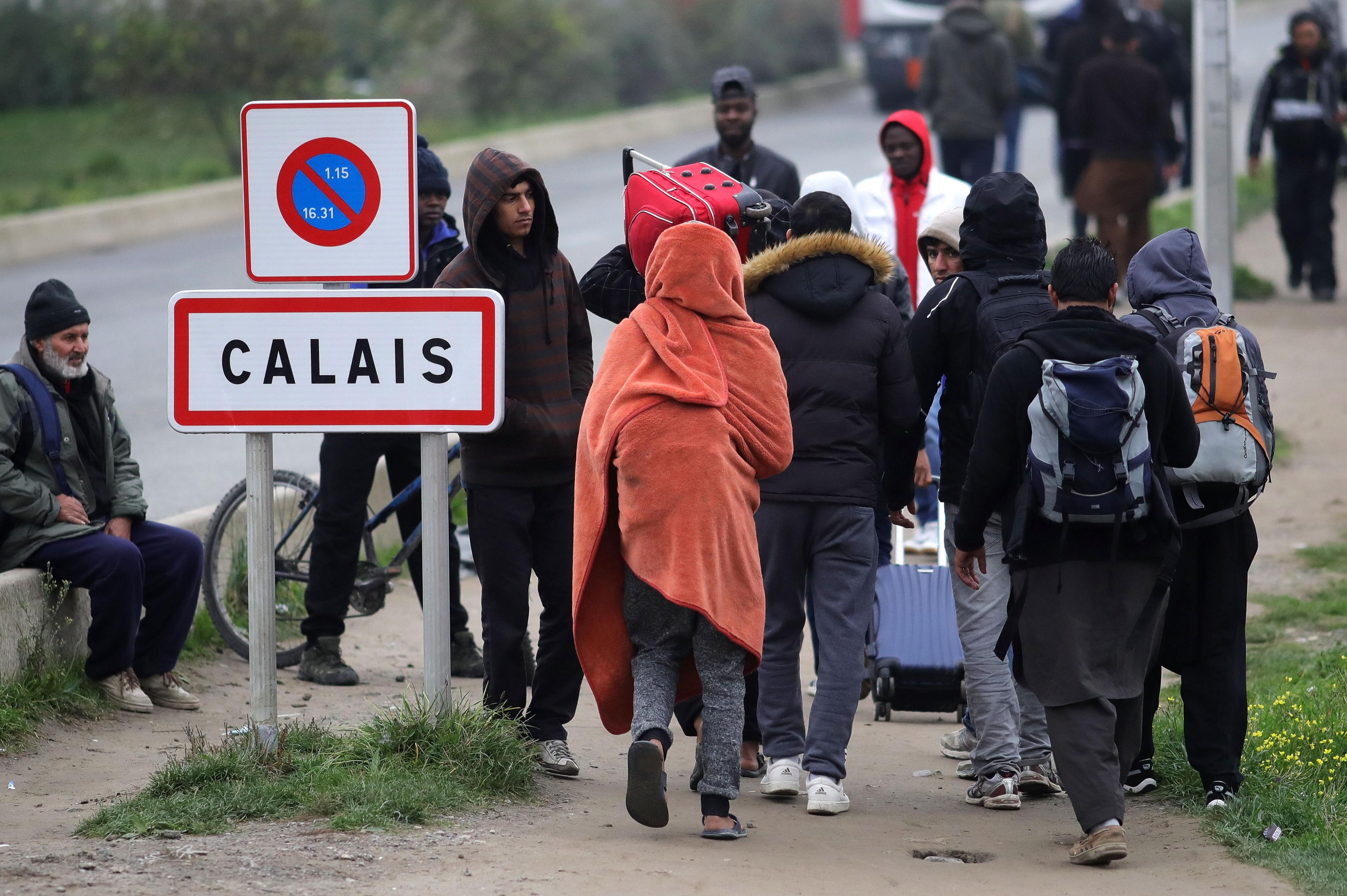 Migrants leave the Jungle