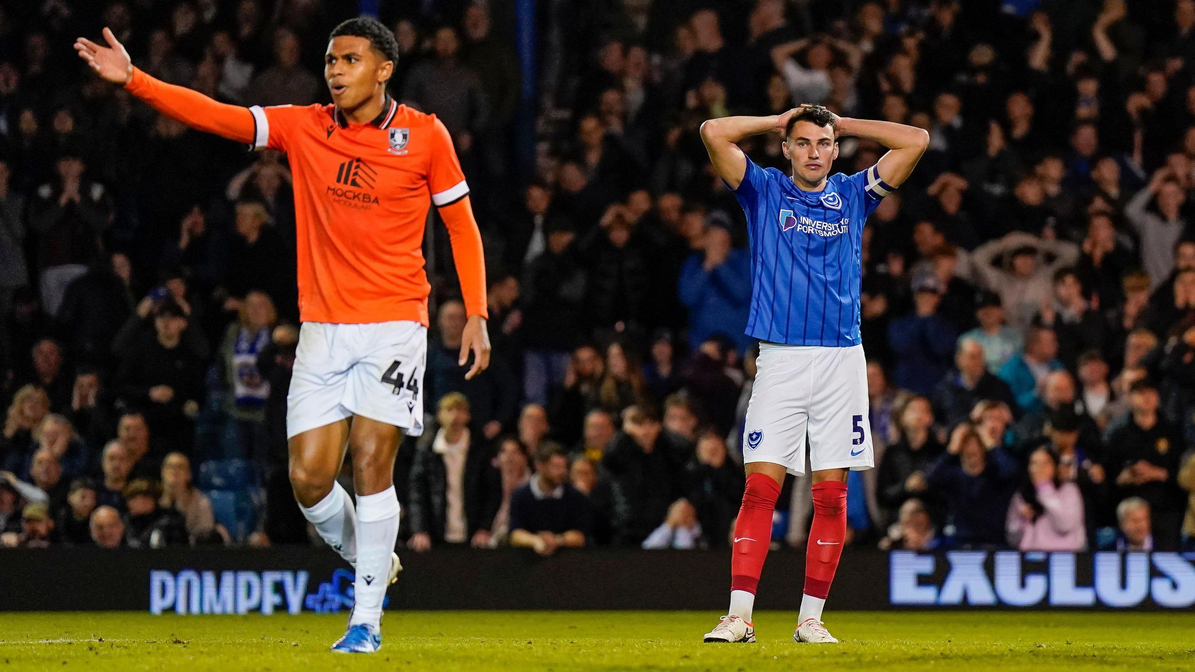 Sheffield Wednesday's Shea Charles and Portsmouth's Regan Poole pictured during the Championship match between the Blues and the Owls