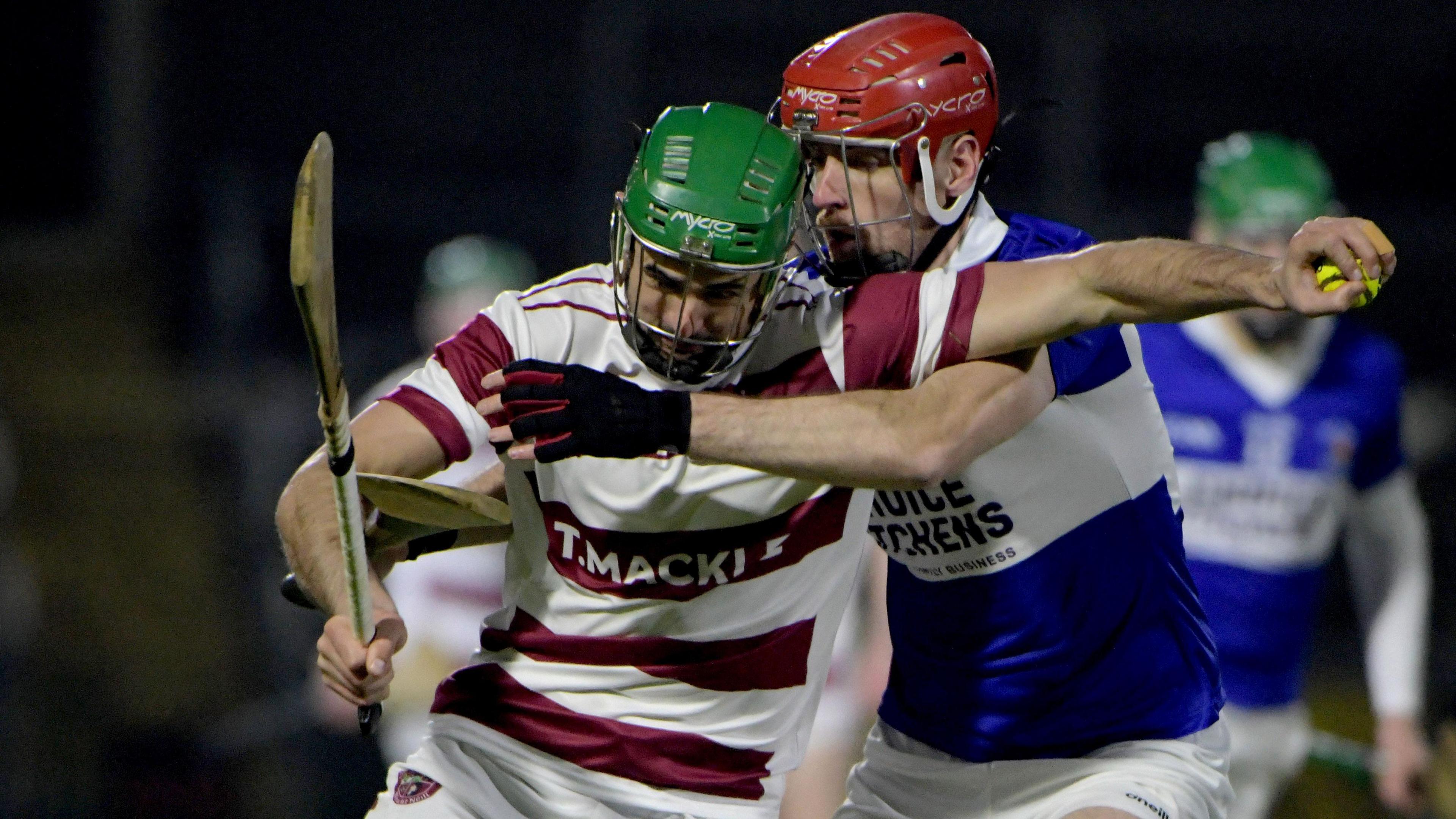 Chrissy McKaigue is challenged by Ryan McNulty