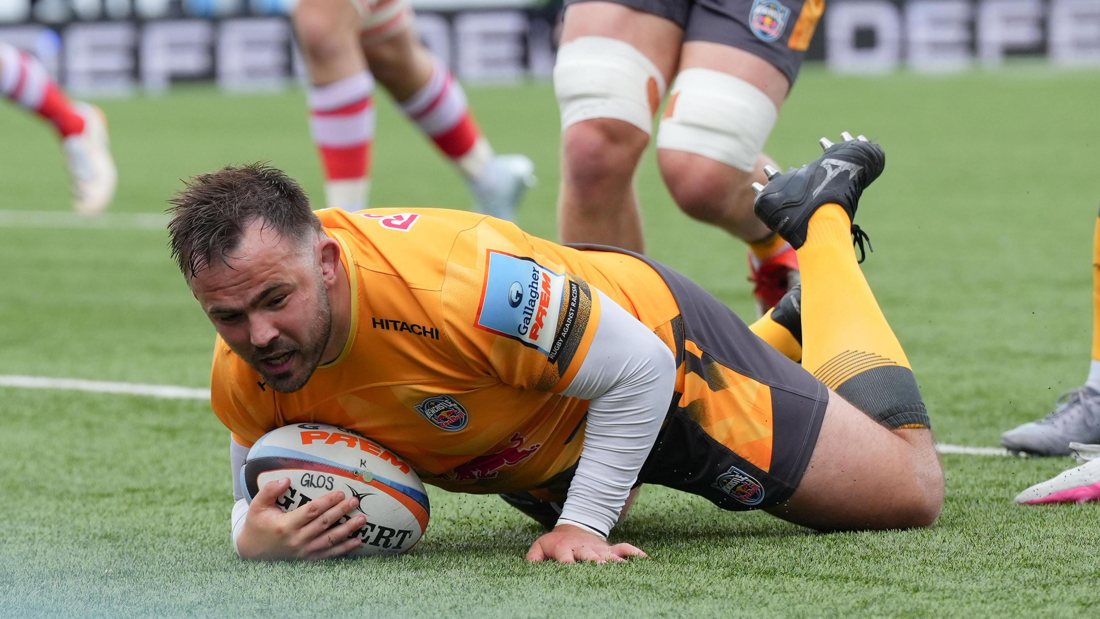 George McGuigan dives over to score for Newcastle Red Bulls against Gloucester at Kingsholm.