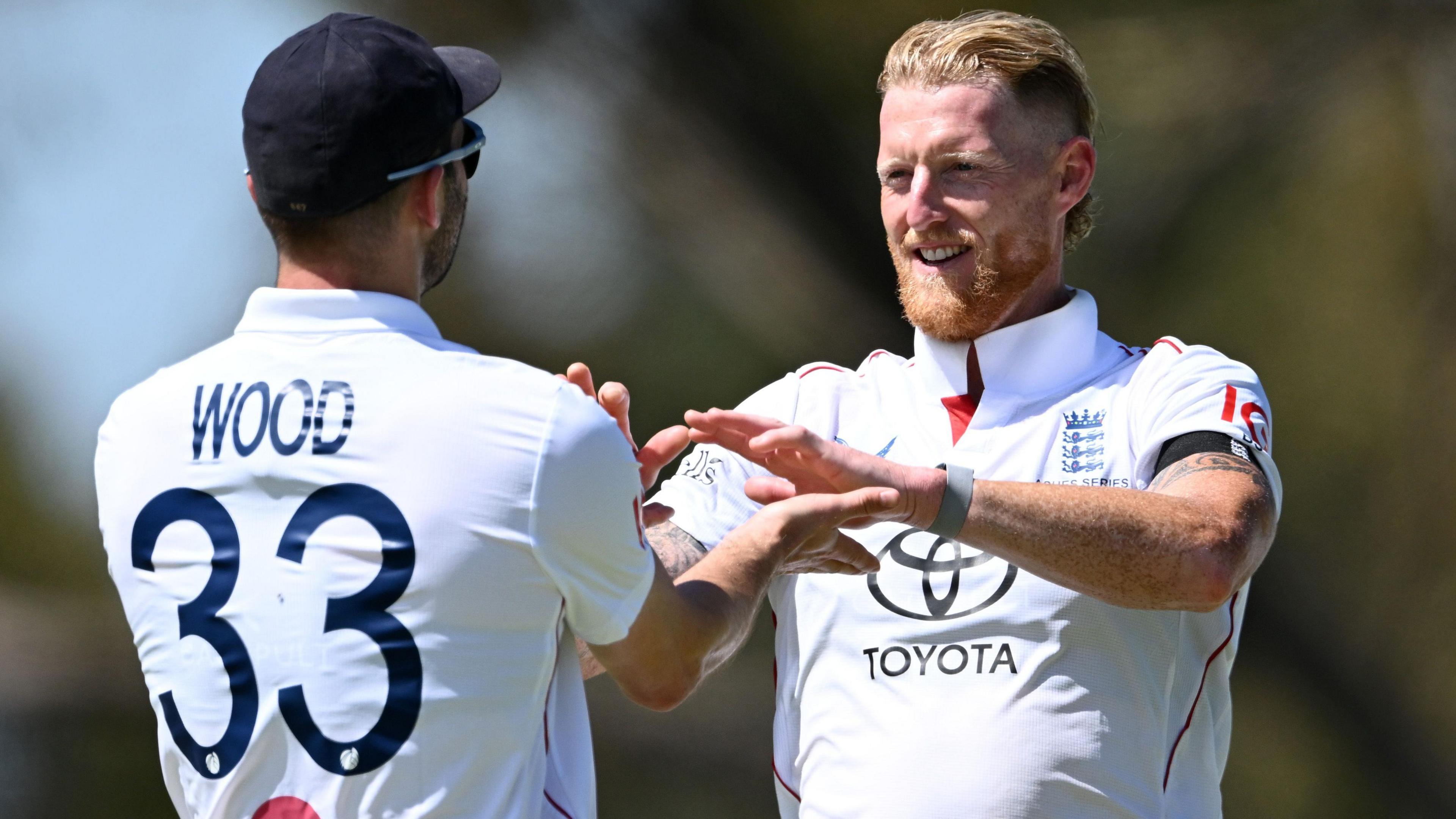 Ben Stokes celebrates with Mark Wood