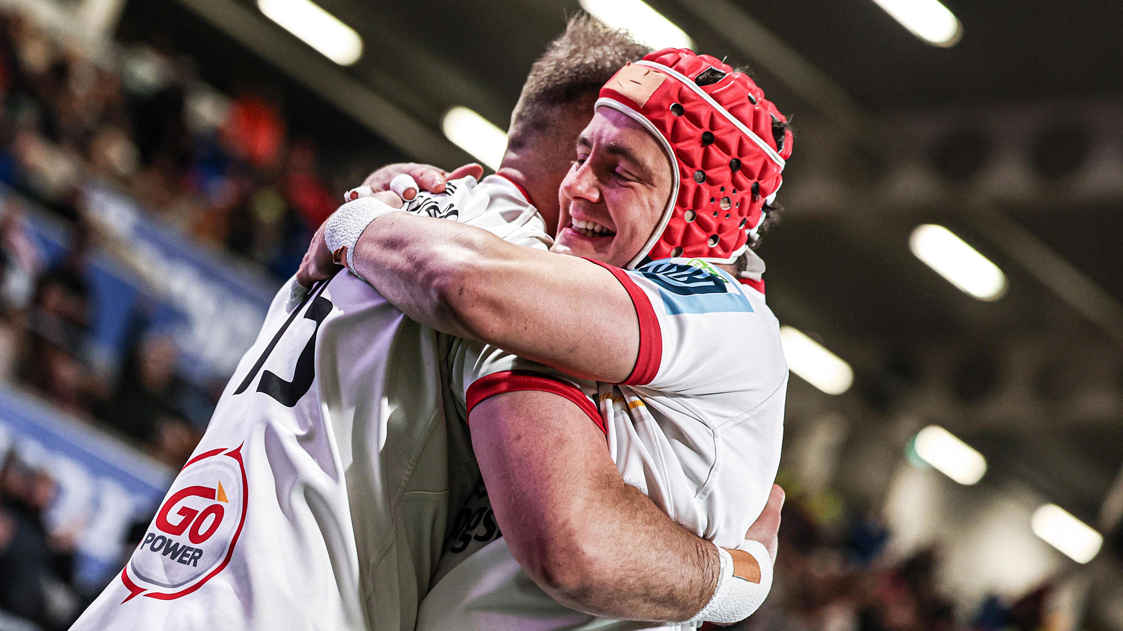 Mike Lowry celebrates a try with Will Addison