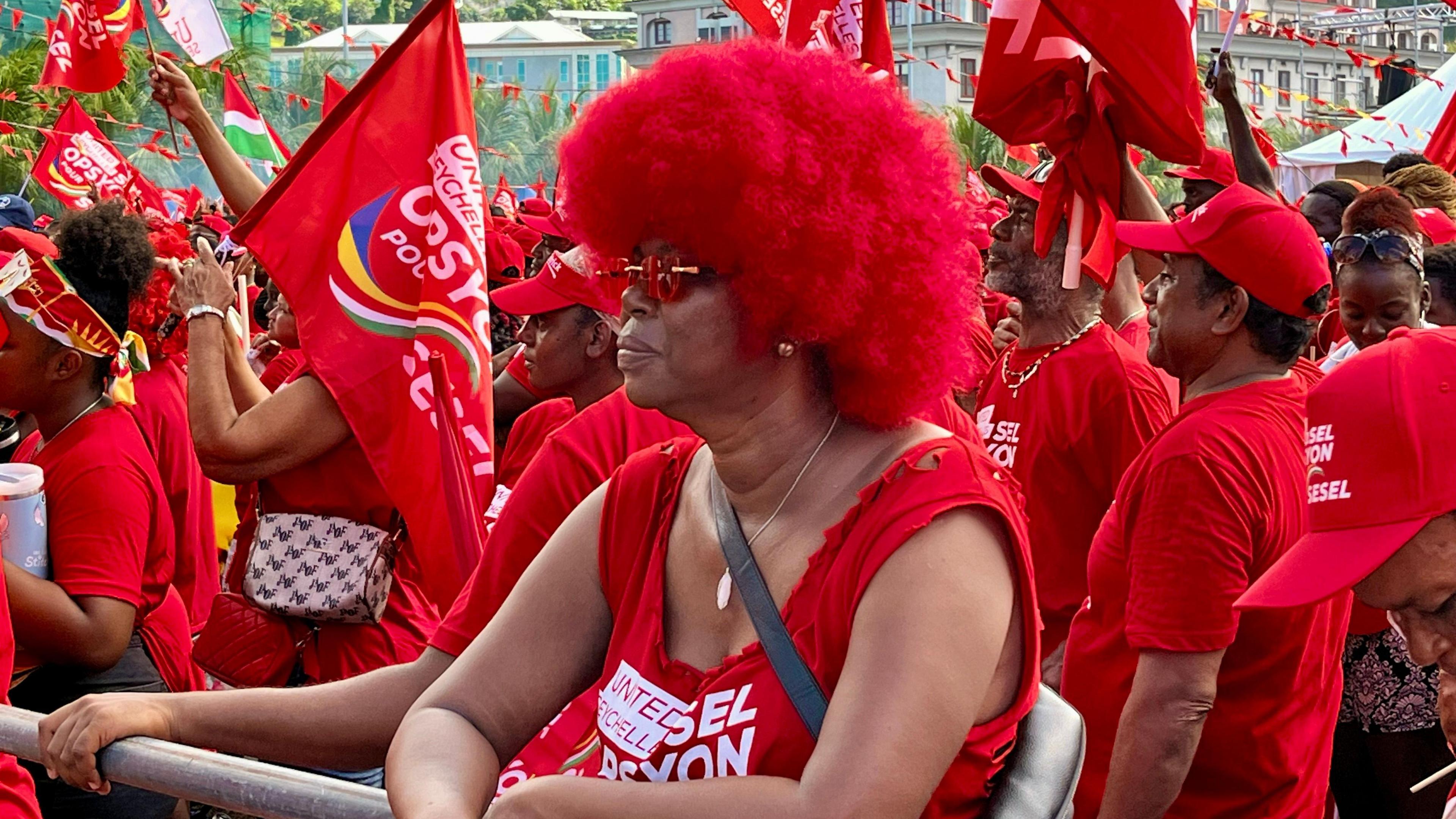 Supporters of United Seychelles (US) at a party campaign rally, wearing red in Victoria, Mahé island on Sunday, 14th September
