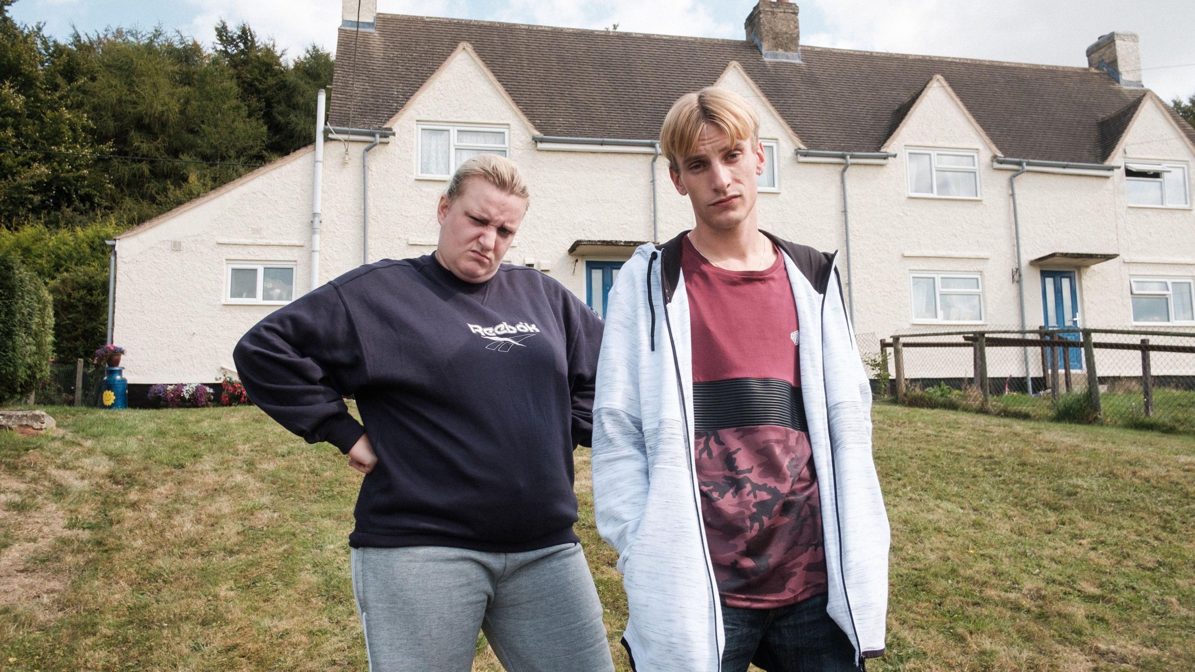 Daisy May and Charlie Cooper as Kerry and Kurtan Mucklowe outside the Kerry's house in Northleach