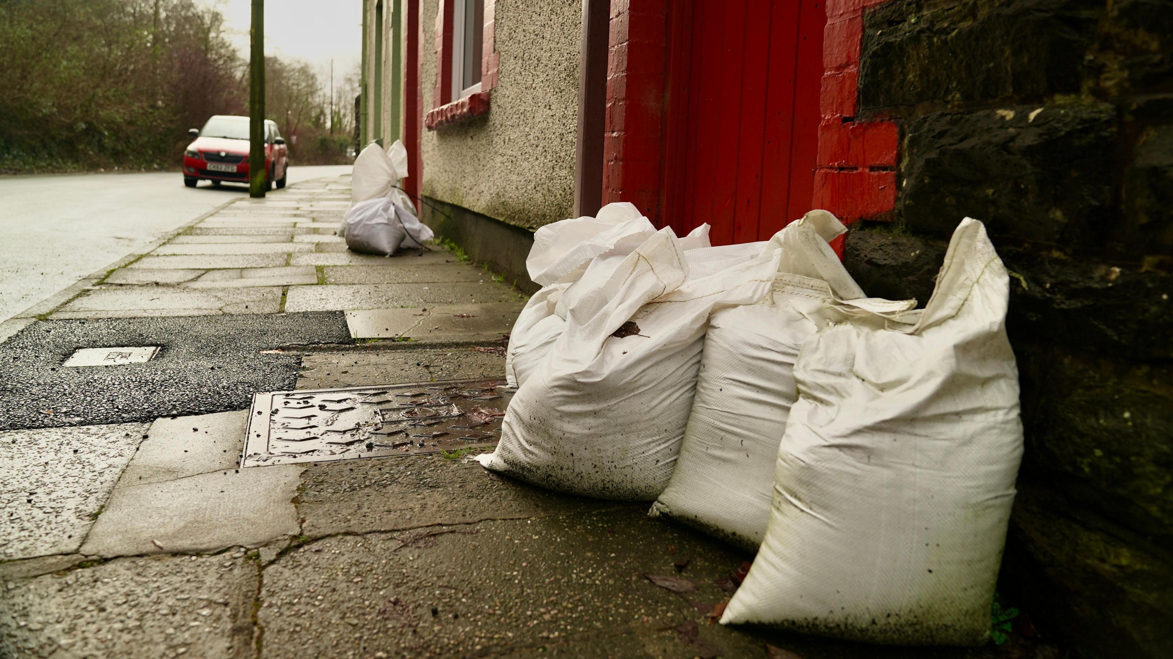 Sandbags outside a house