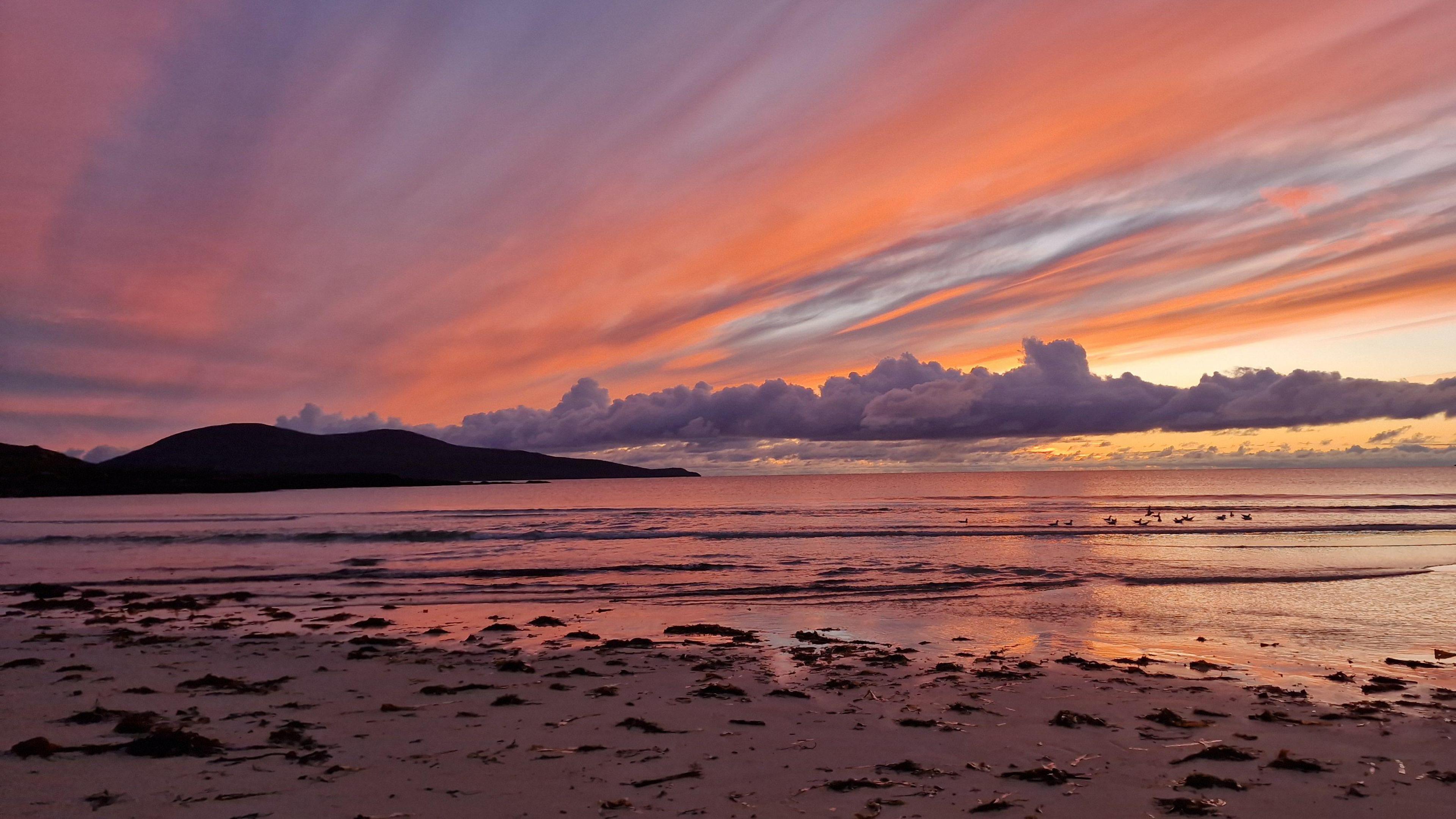 Sunset on Niseaboist beach on the Isle of Harris