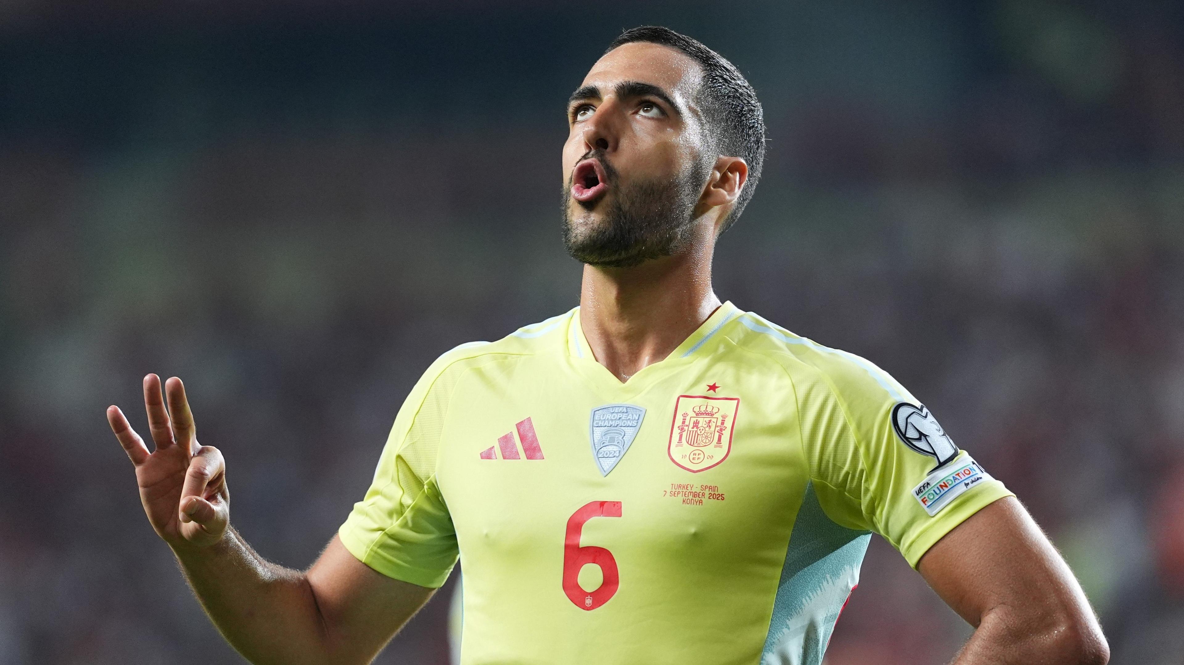 Mikel Merino holds up 3 fingers aft scoring a hat-trick for Spain against Turkey successful nan World Cup qualifiers