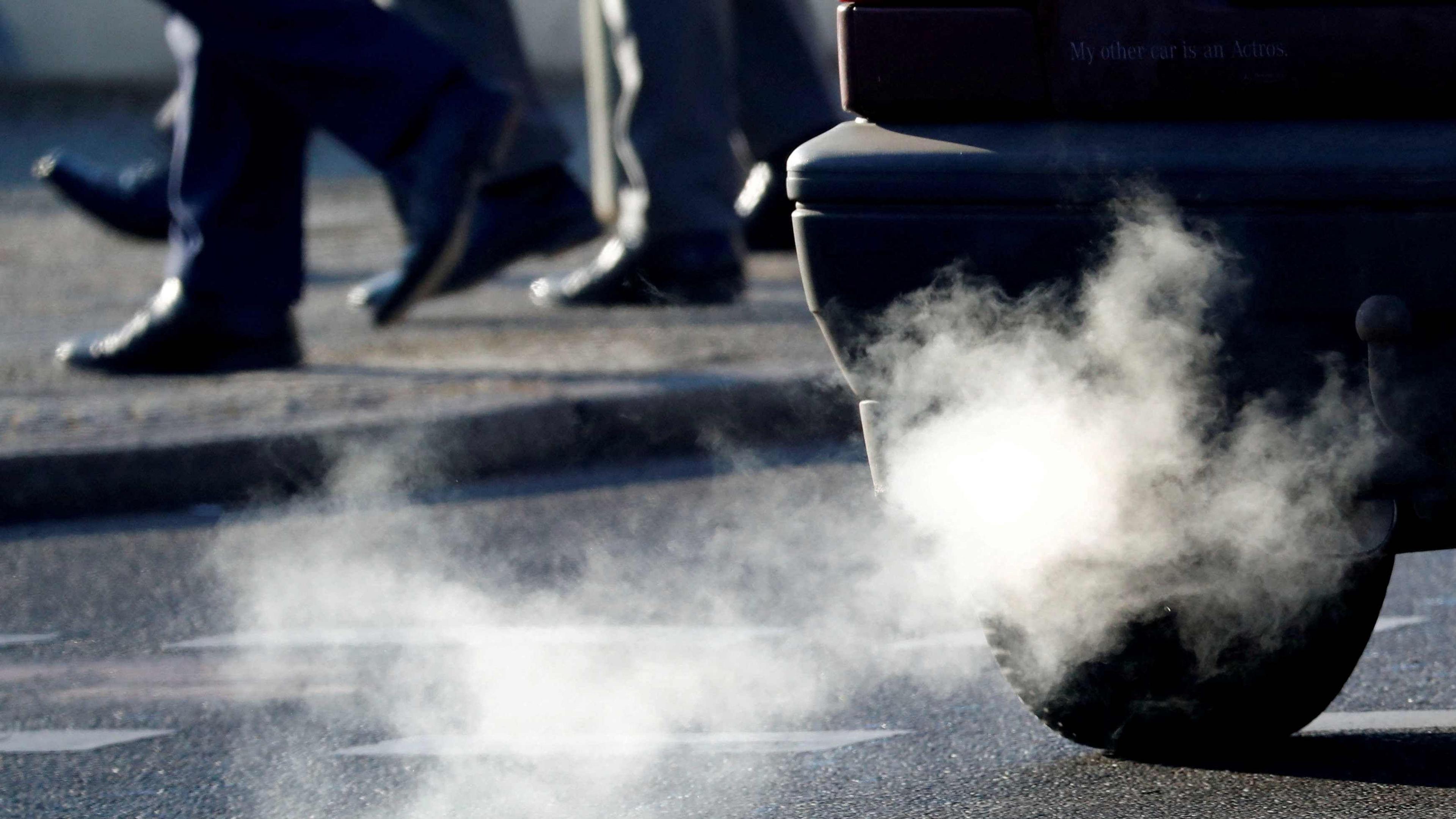 Car exhaust pipe, polluting the streets