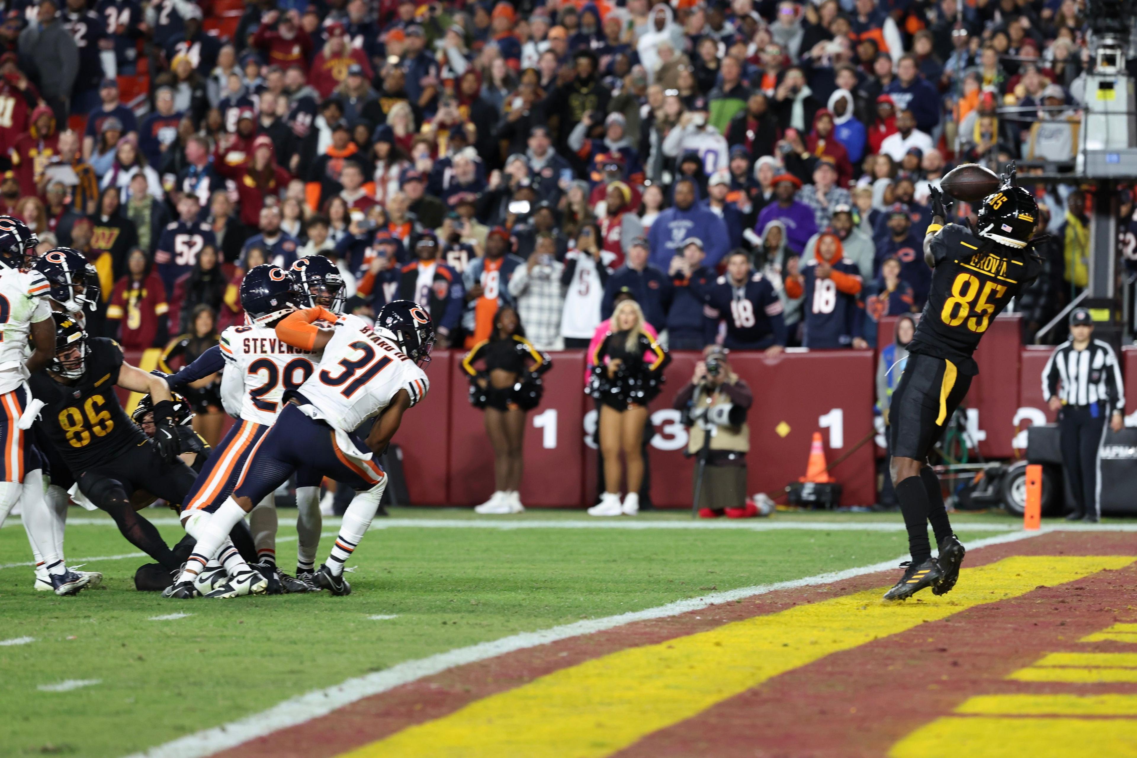 Noah Brown of the Washington Commanders catches a Hail Mary touchdown pass to beat the Chicago Bears