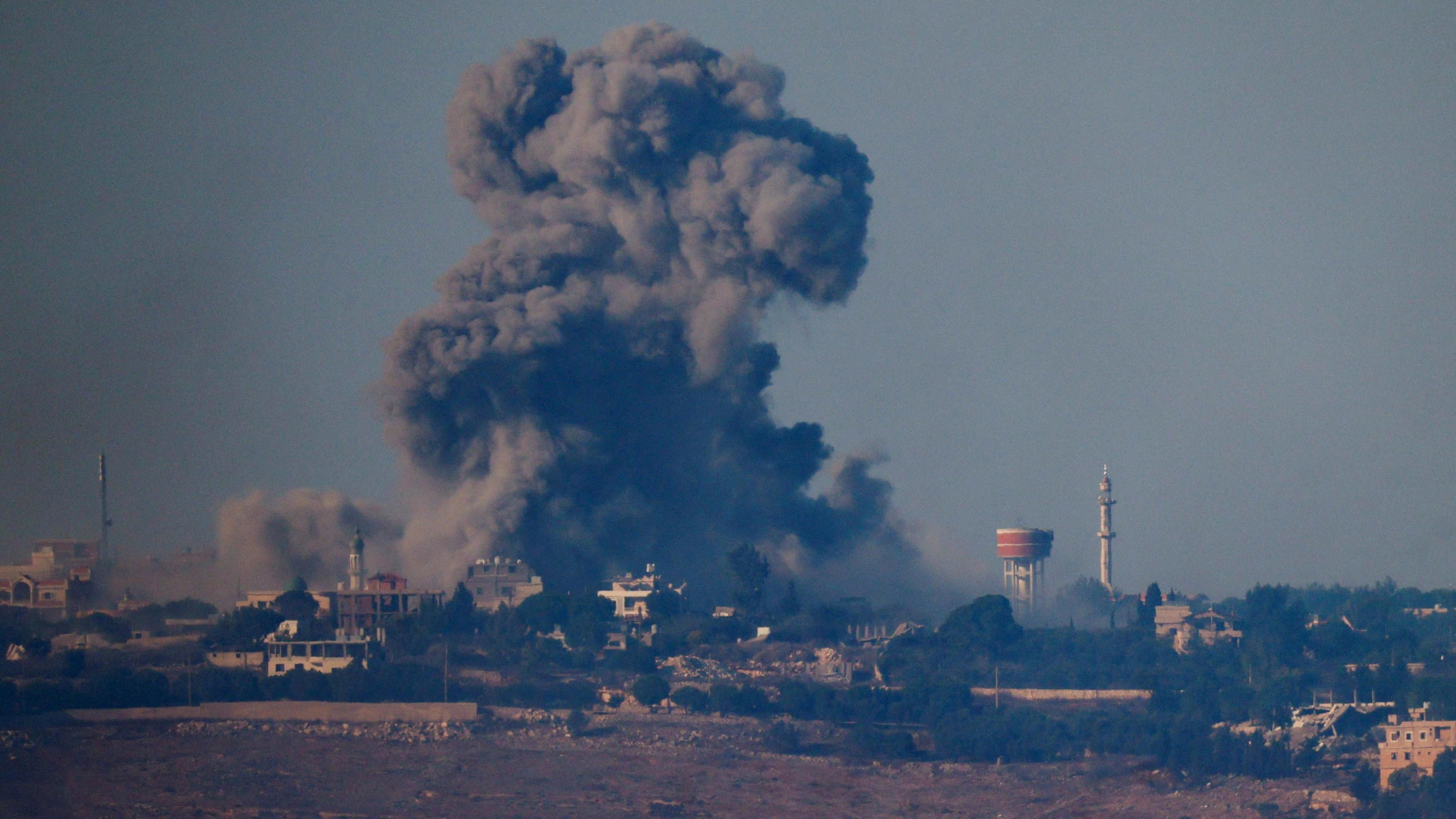 Smoke billows after an Israeli Air Force air strike in southern Lebanon village