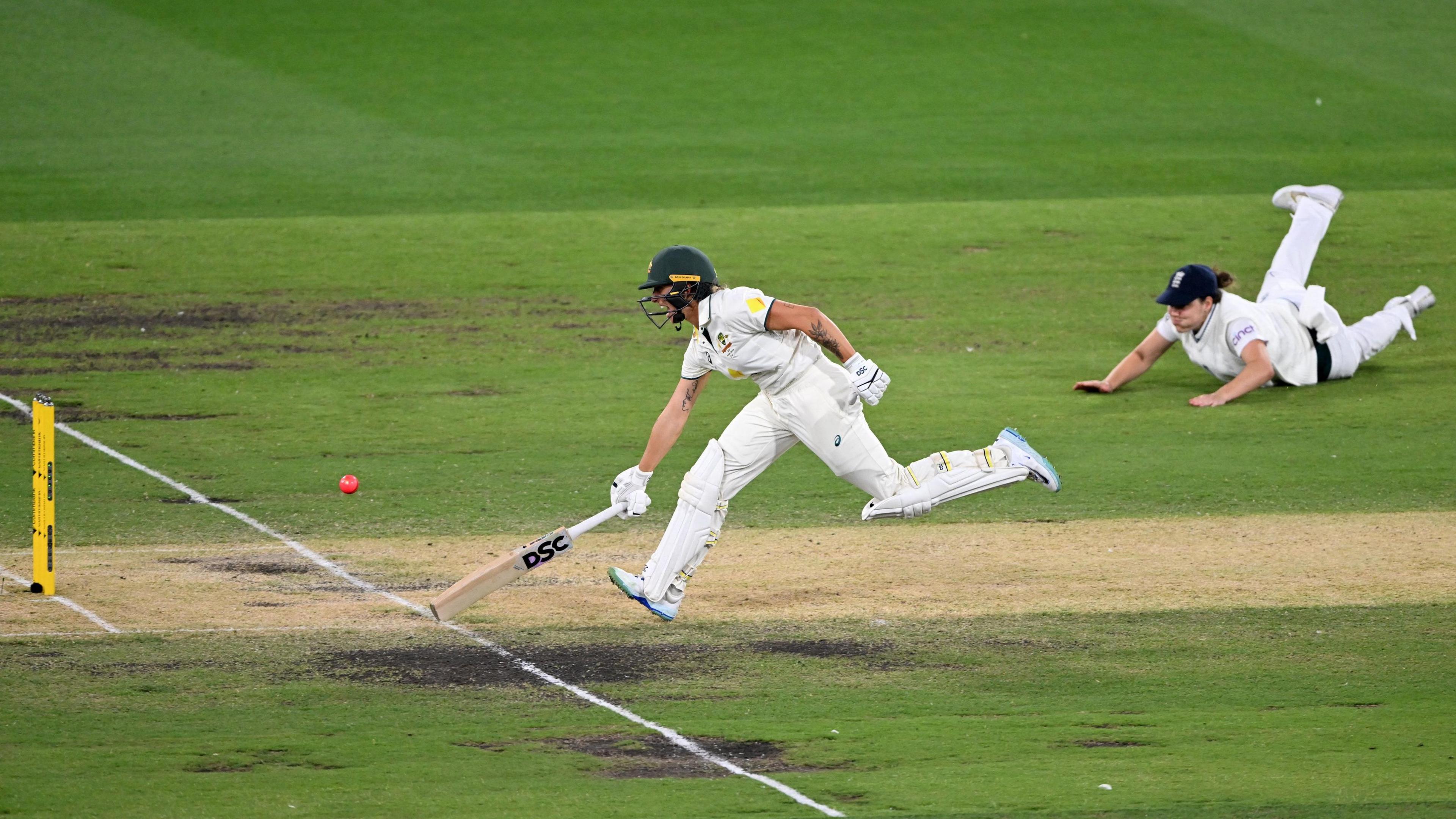 England's Nat Sciver-Brunt attempts to run out Australia's Ashleigh Gardner. 
