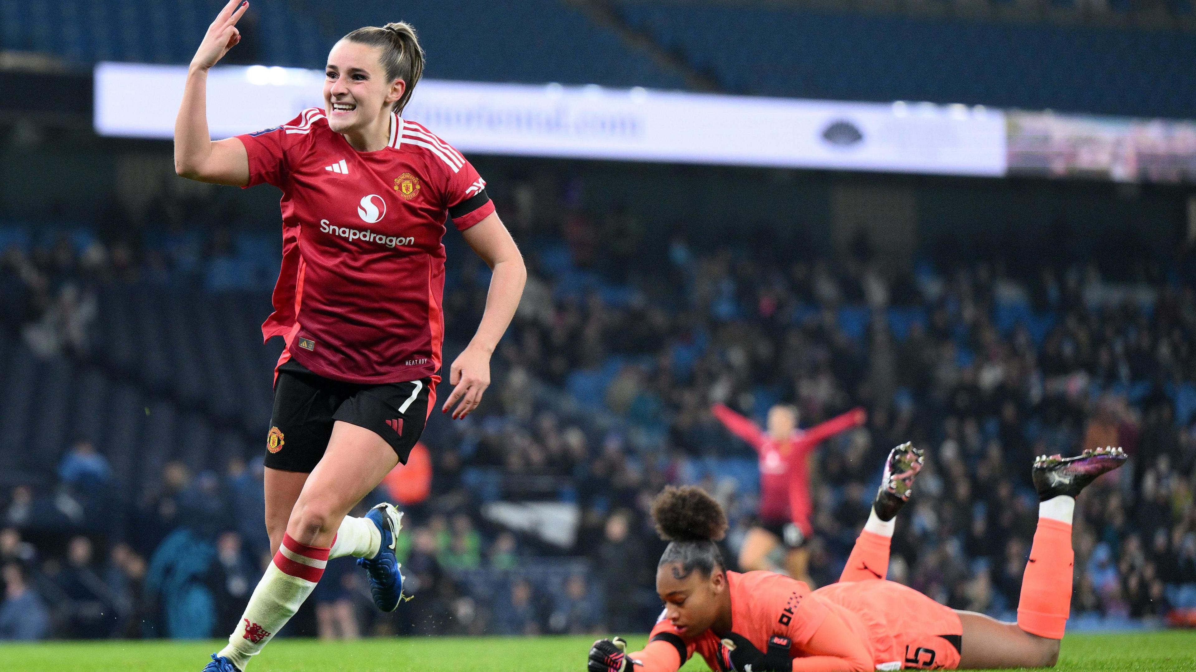 Ella Toone celebrates her hat-trick as Man City goalkeeper Khiara Keating lies on the ground