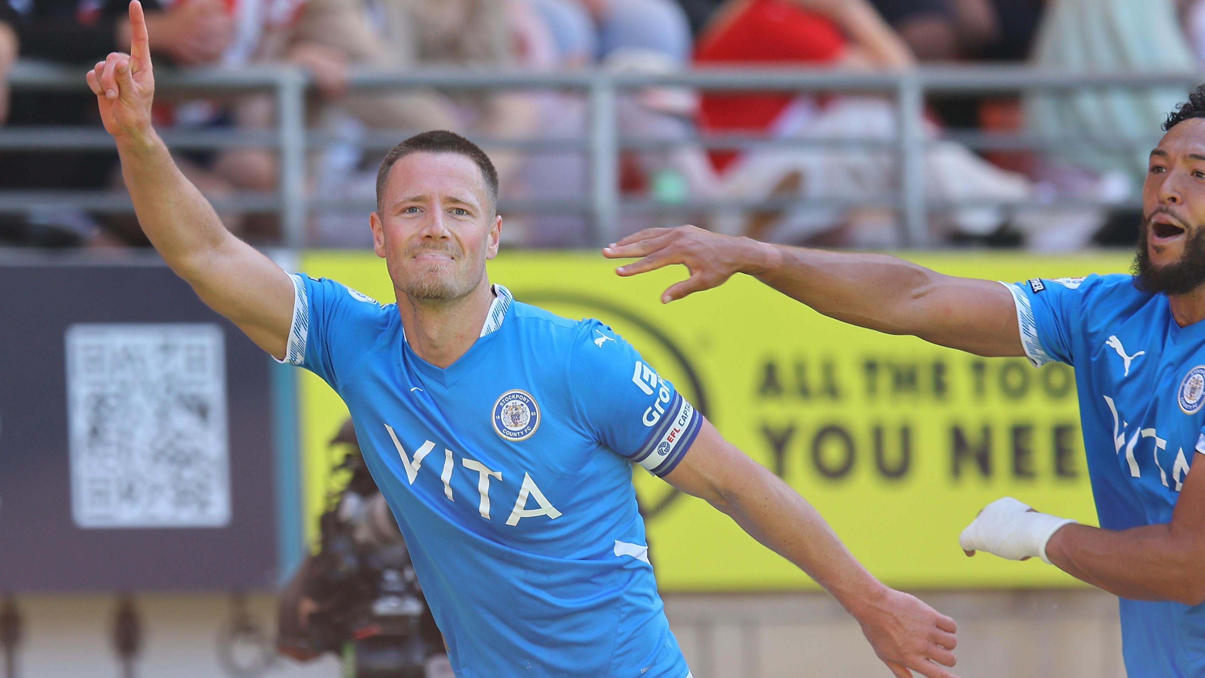 Stockport County captain Fraser Horsfall celebrates making it 2-1