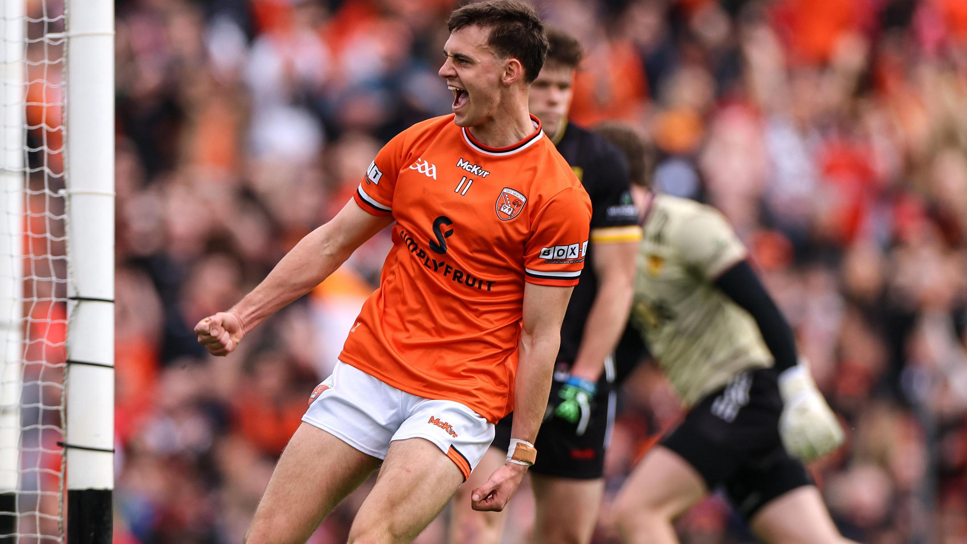 Darragh McMullen celebrates scoring a goal against Down 