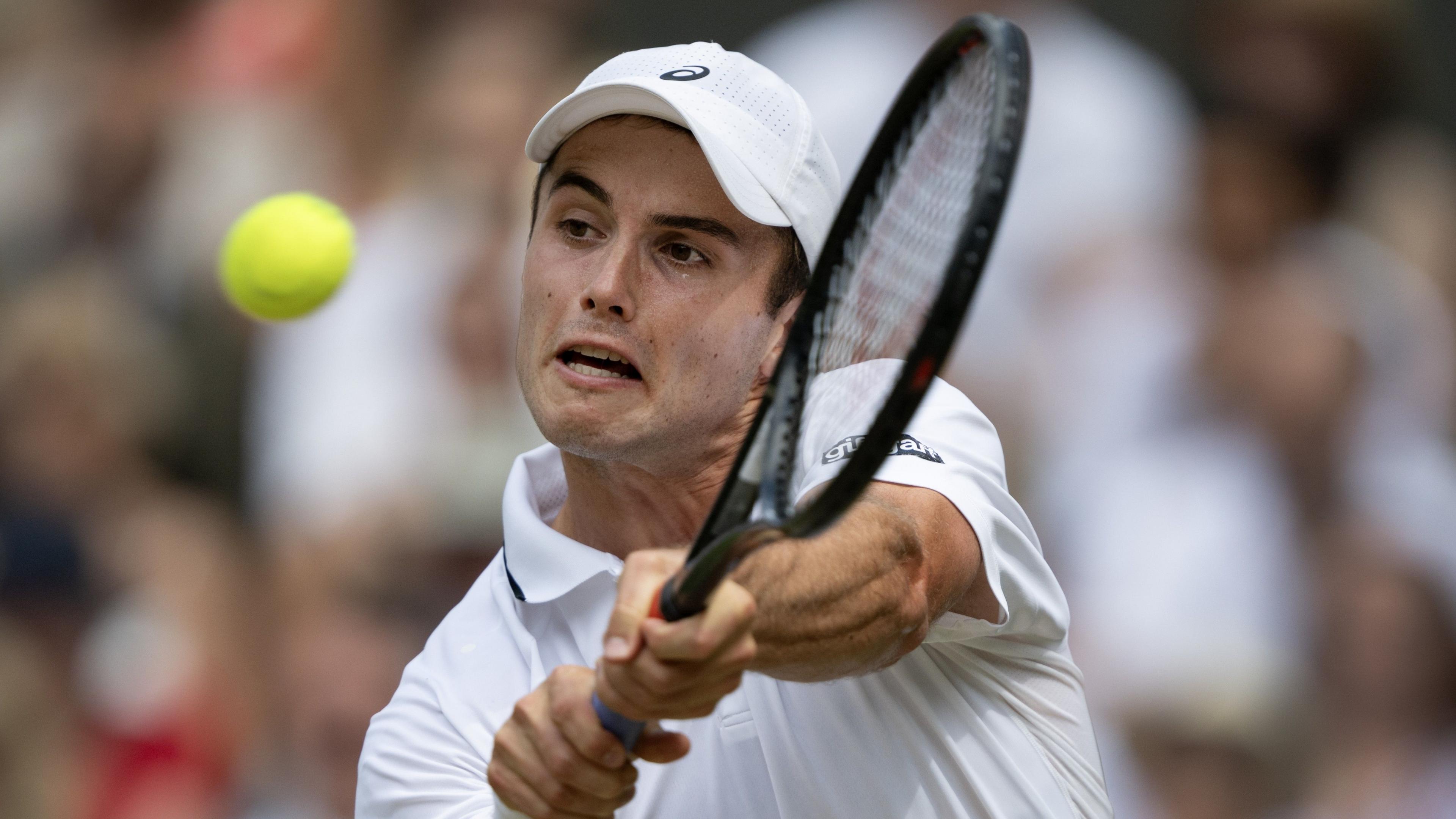 Arthur Fery hits a backhand at Wimbledon