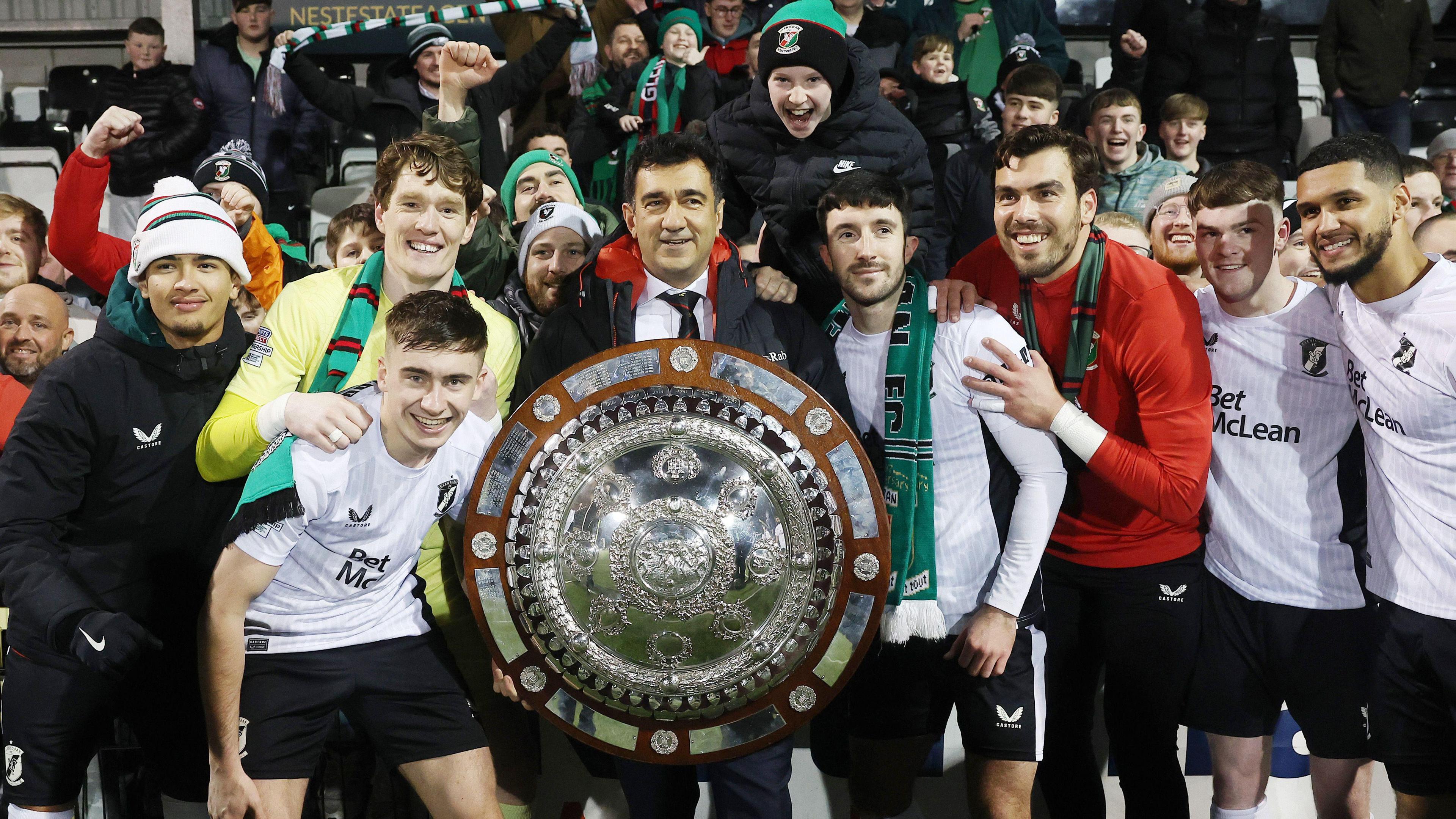 Ali Pour with Glentoran squad and County Antrim Shield