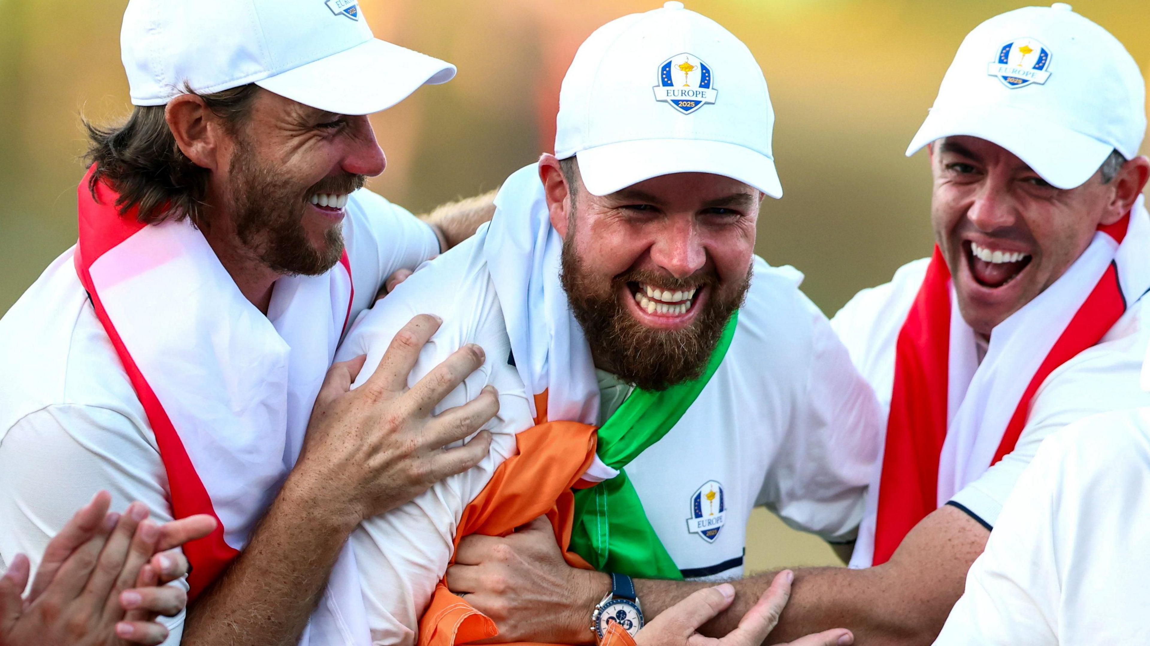 Tommy Fleetwood, Shane Lowry and Rory McIlroy celebrate Europe's victory over the US at Bethpage