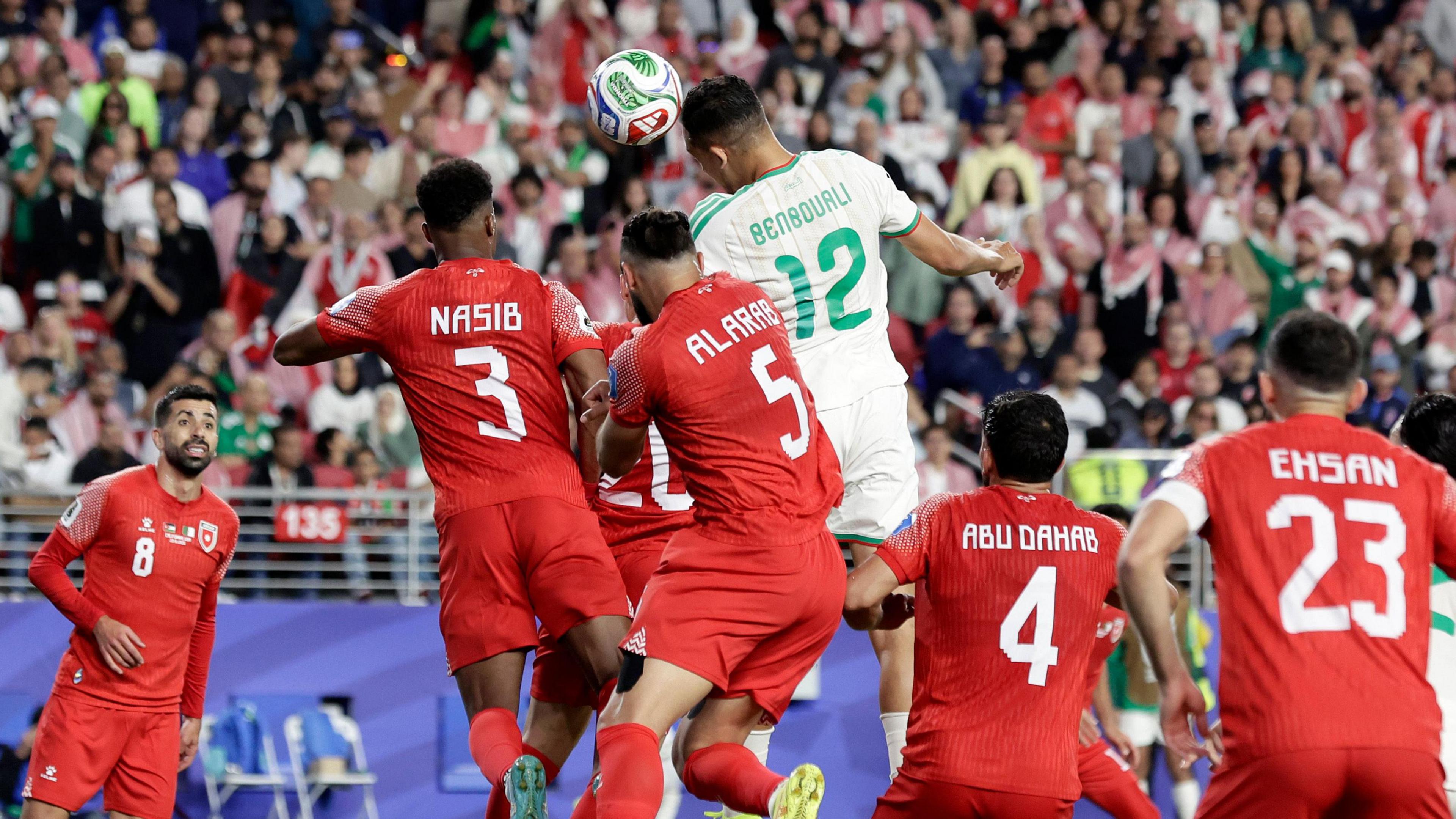Nadhir Benbouali heads home a corner