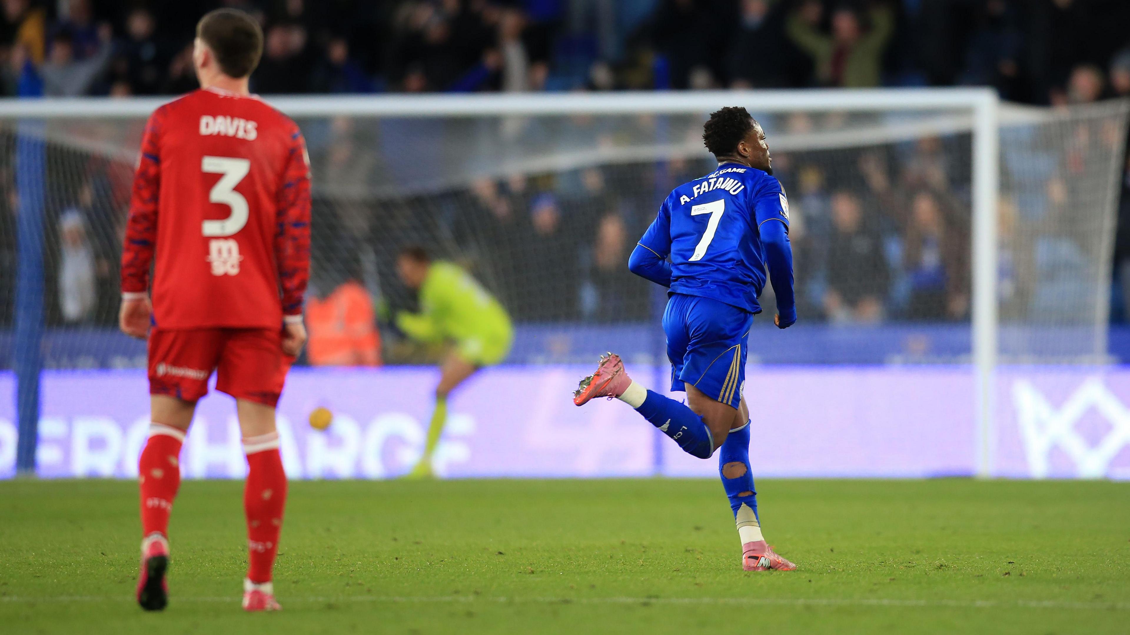 Leicester's Abdul Fatawu runs away to celebrate scoring from inside his own half against Ipswich