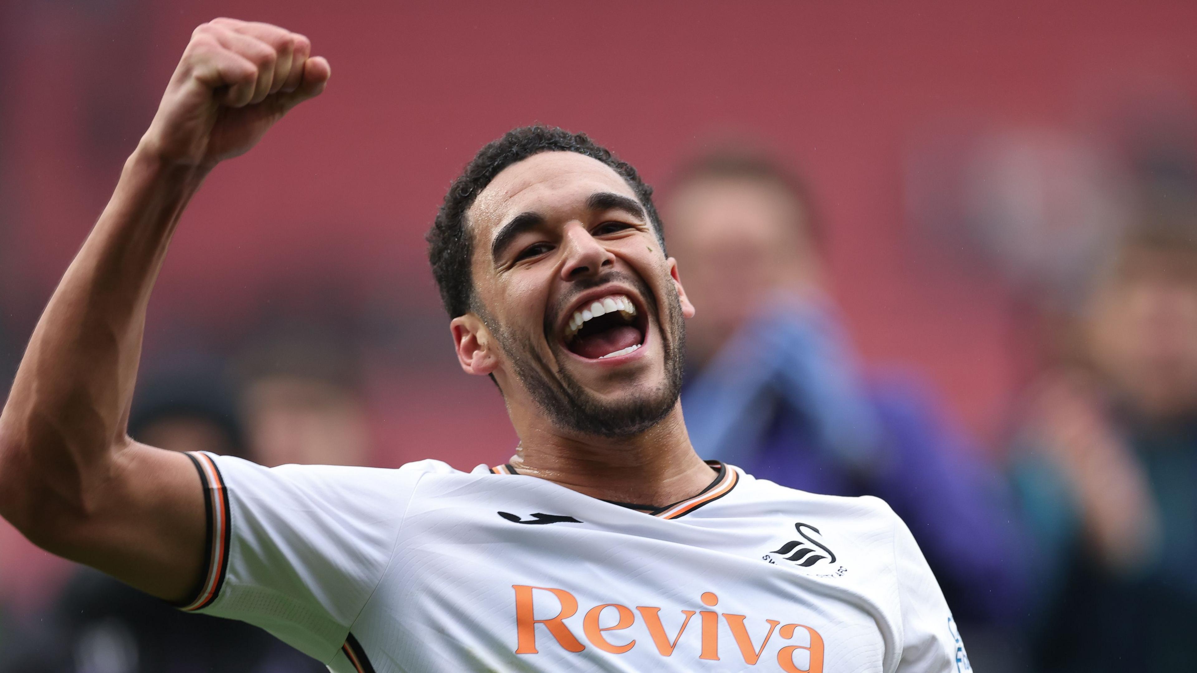 Swansea City centre-back Ben Cabango celebrates