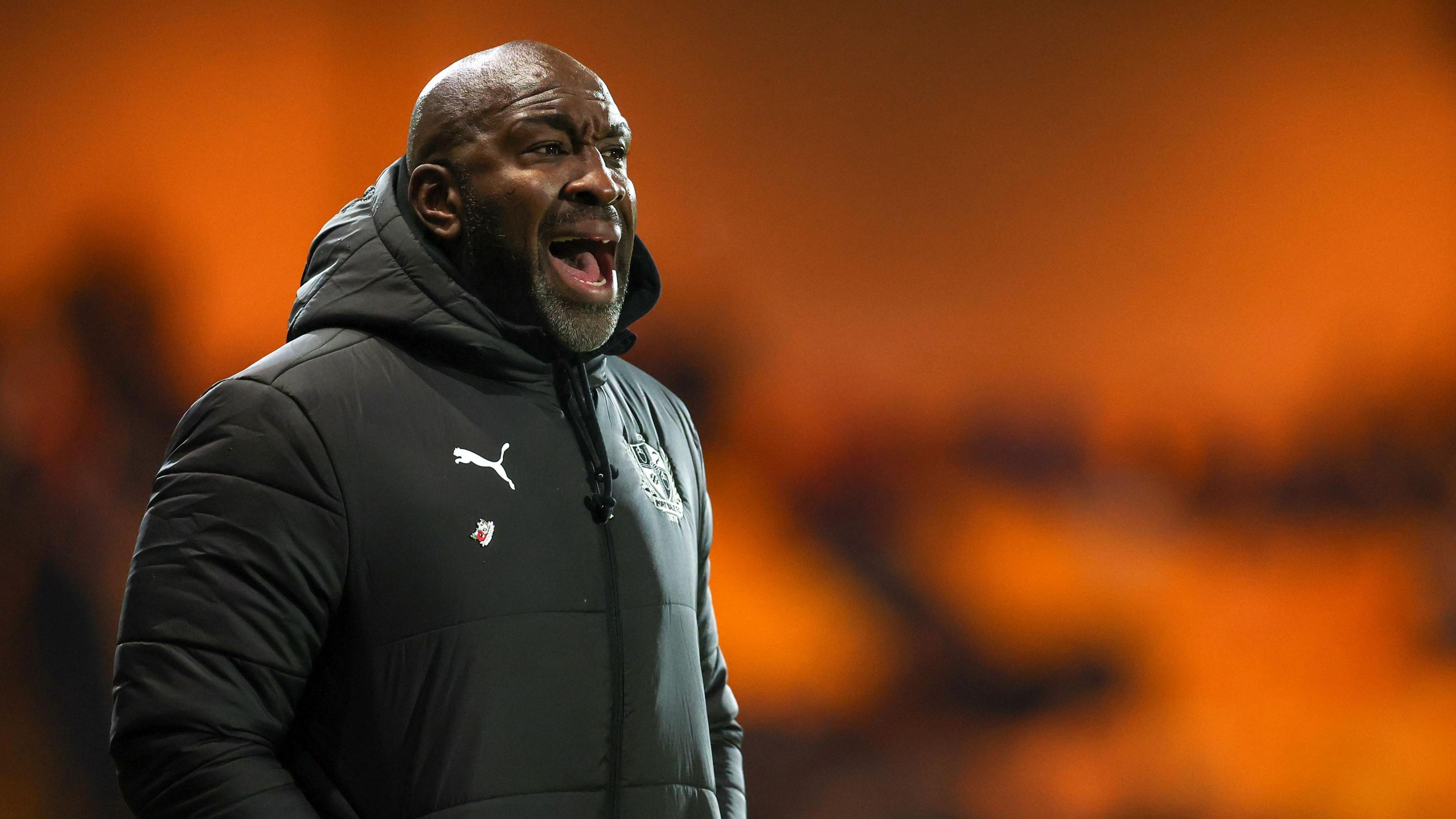 Darren Moore shouts from the touchline during a match