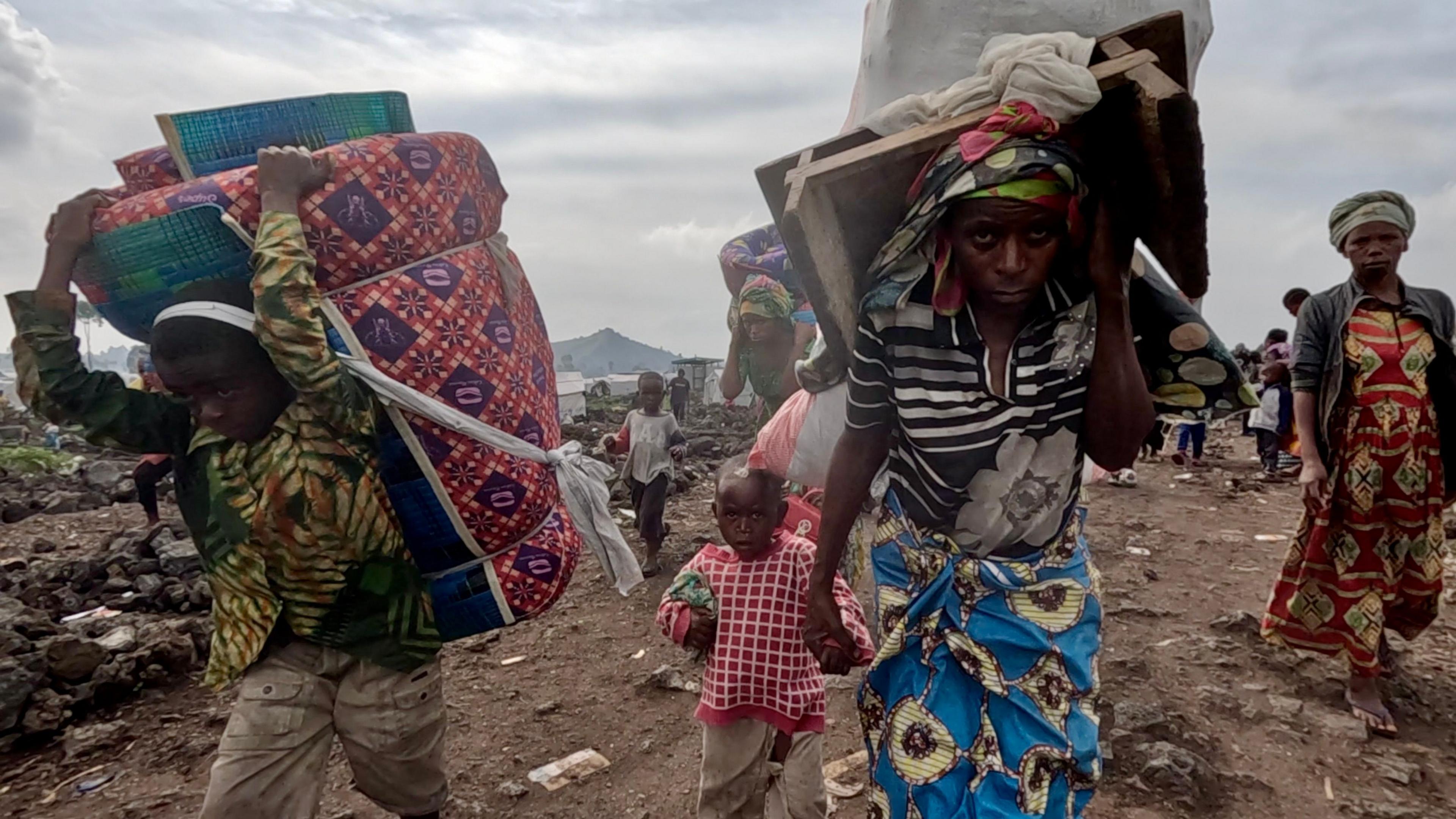 Family leaving Bulengo camp in Goma, DR Congo - February 2025