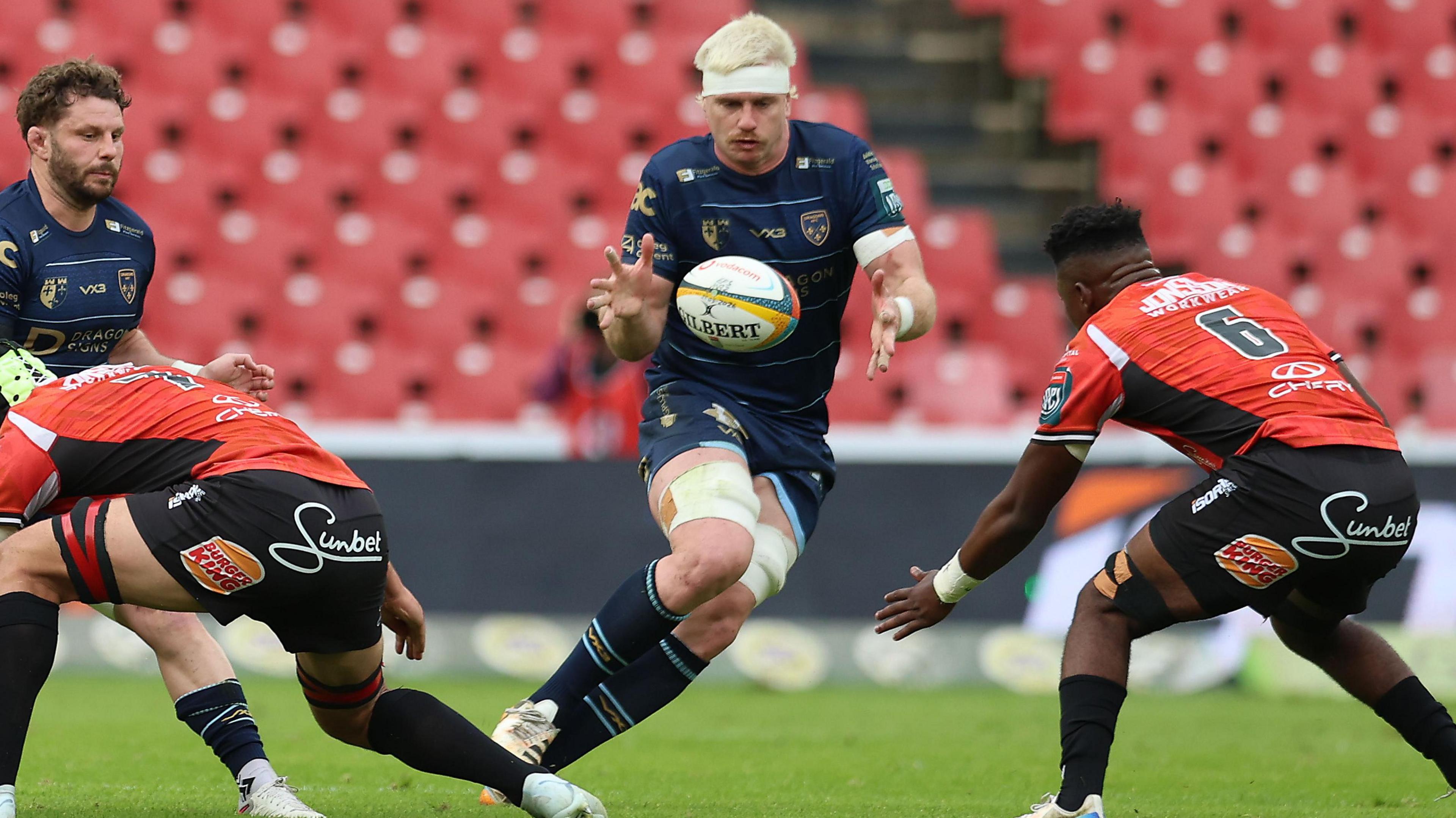 Aaron Wainwright runs with the ball for Dragons at Lions