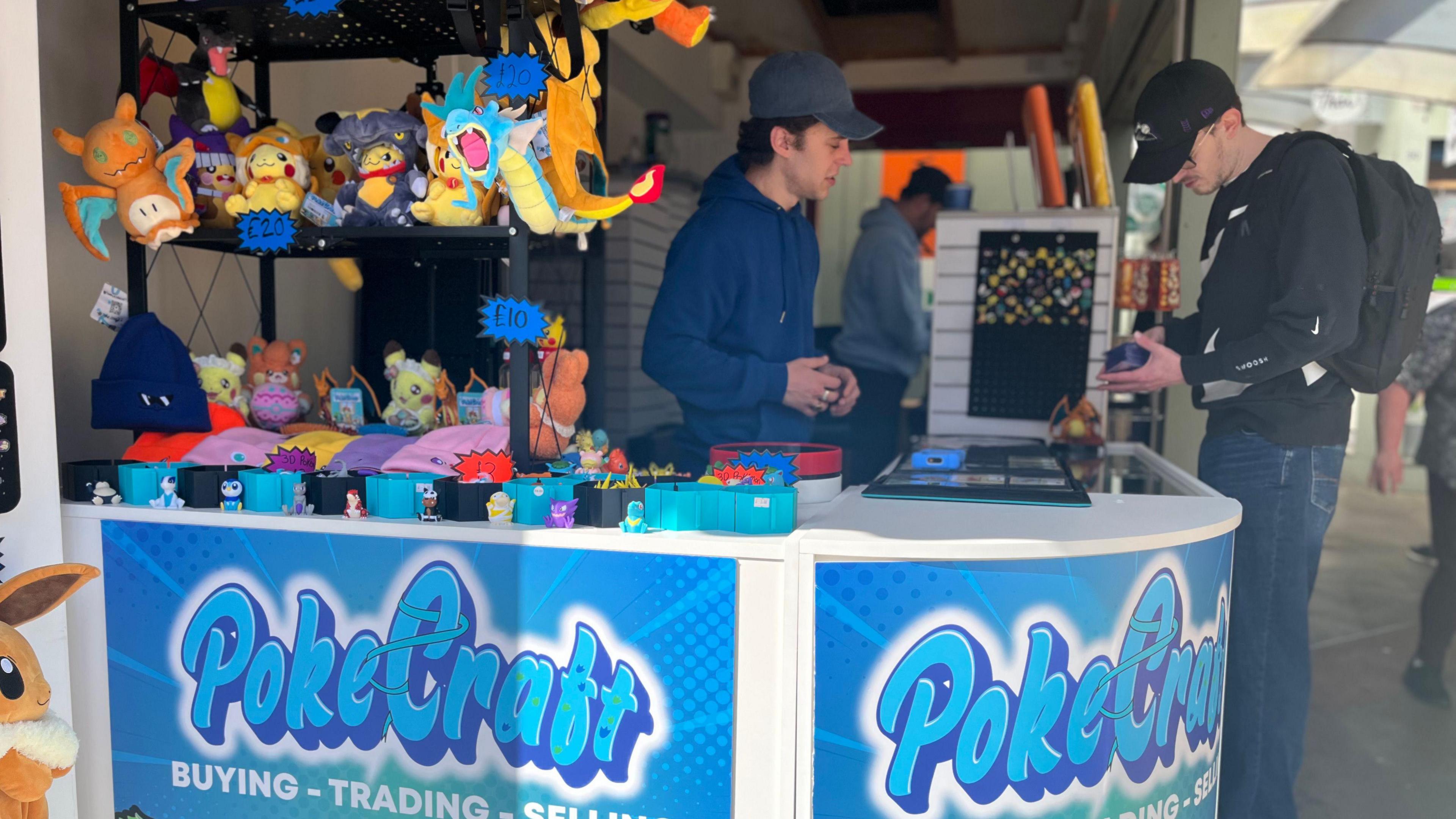 pok-mon-fans-ensure-success-of-norwich-market-stall-bbc-news