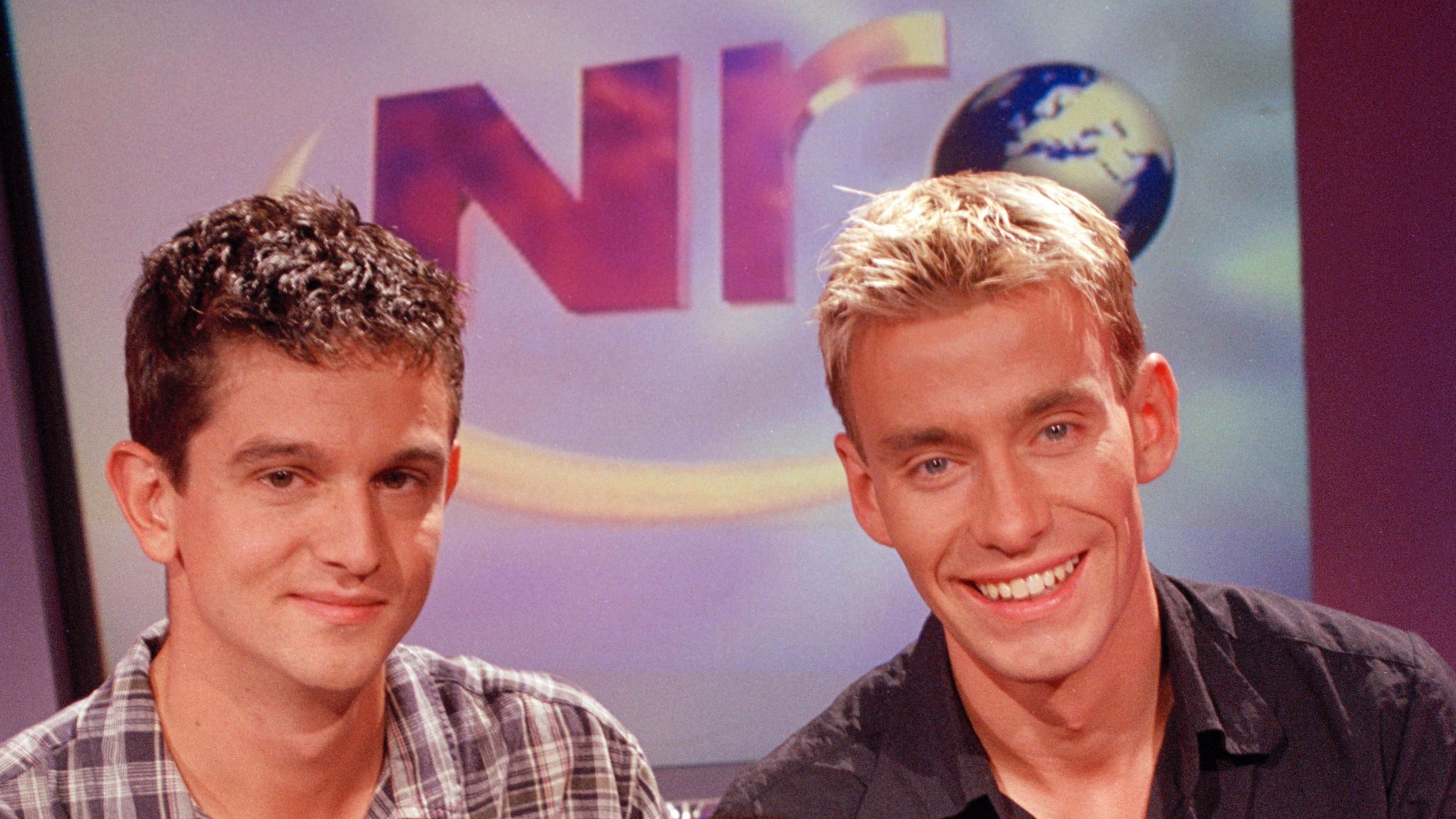 Archive shot of Newsround presenters Matthew Price and David Bull