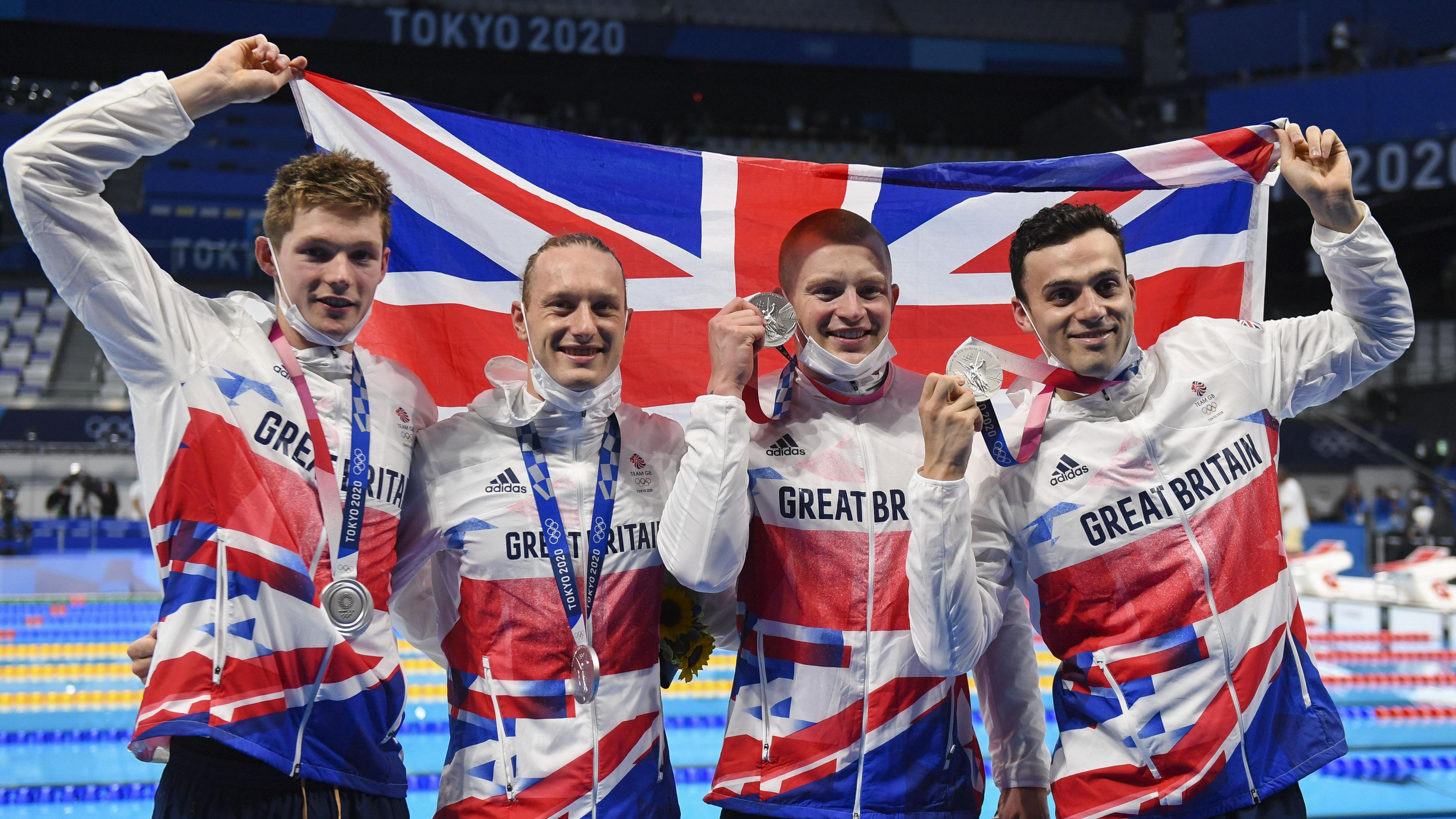 Luke Greenbank (second left) with men's 4x100 m medley relay team-mates Duncan Scott, Adam Peaty and James Guy