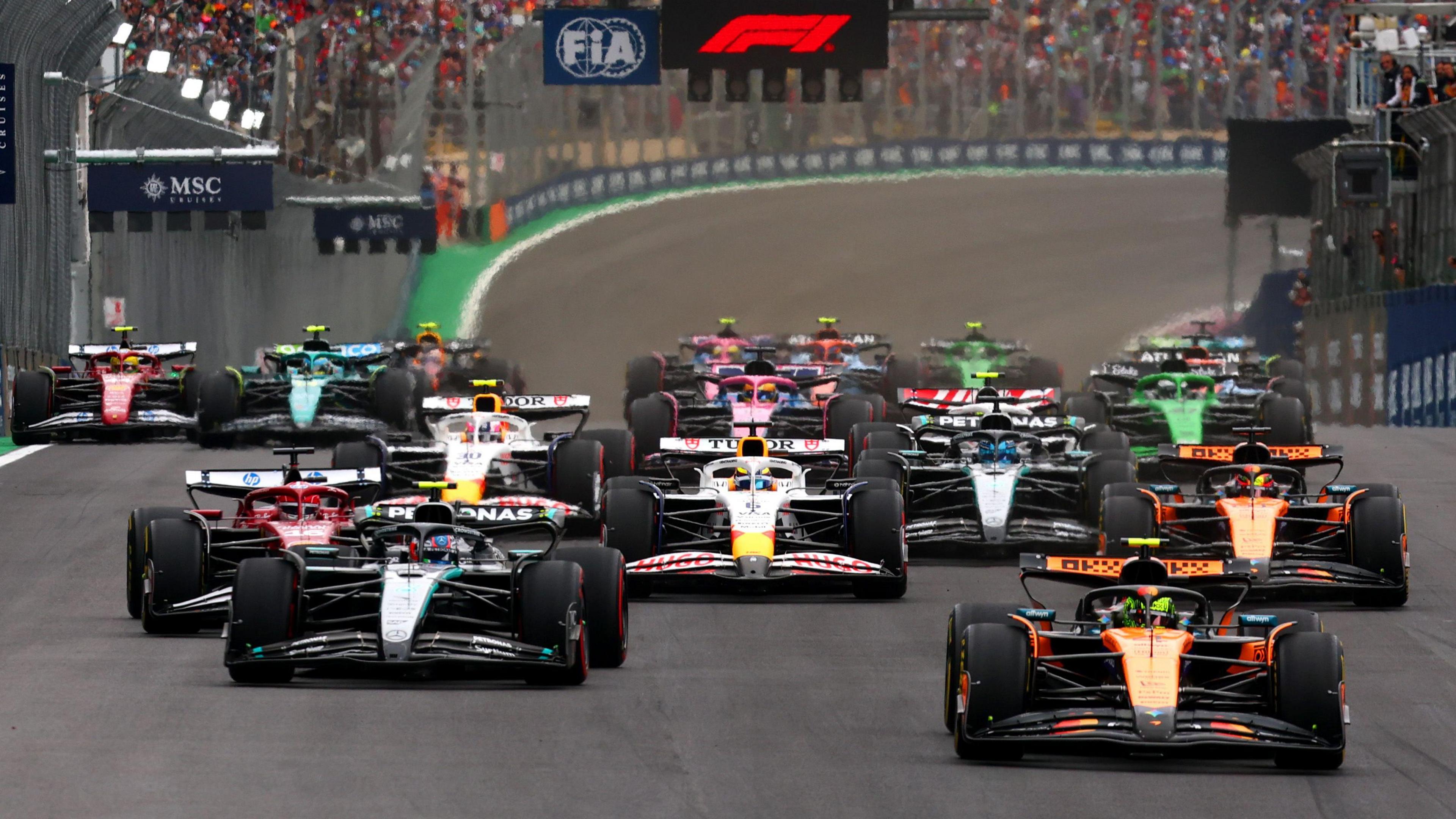 Lando Norris leads the field towards the first corner of the Sao Paulo Grand Prix