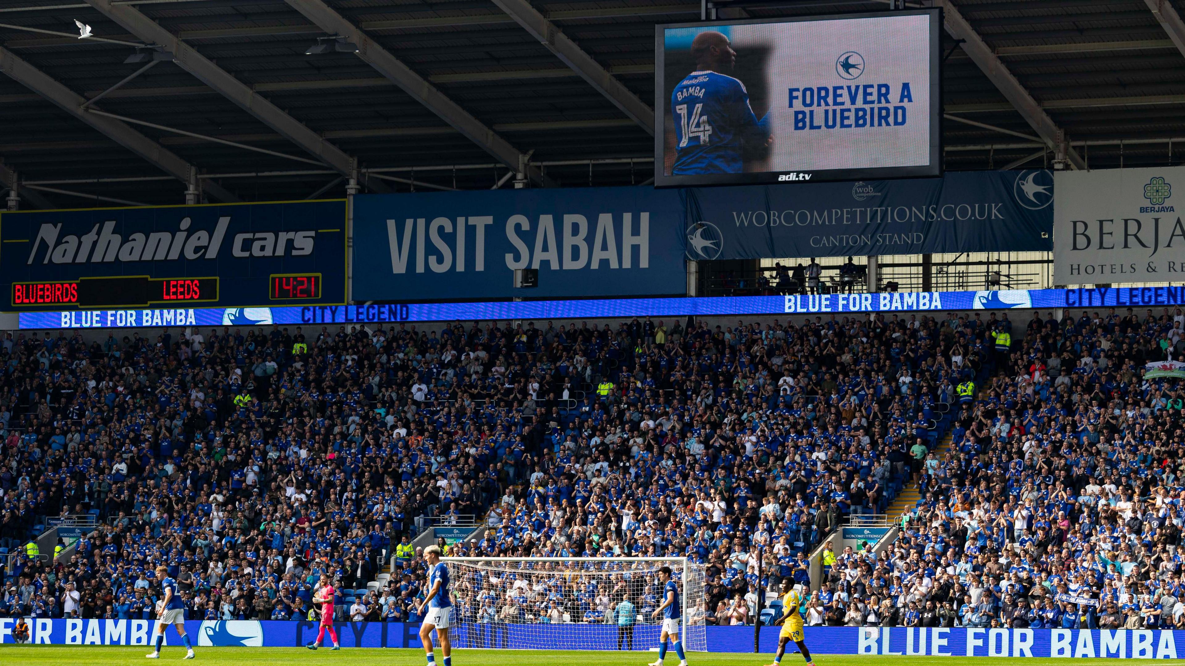 Cardiff City fans applaud in memory of Sol Bamba 