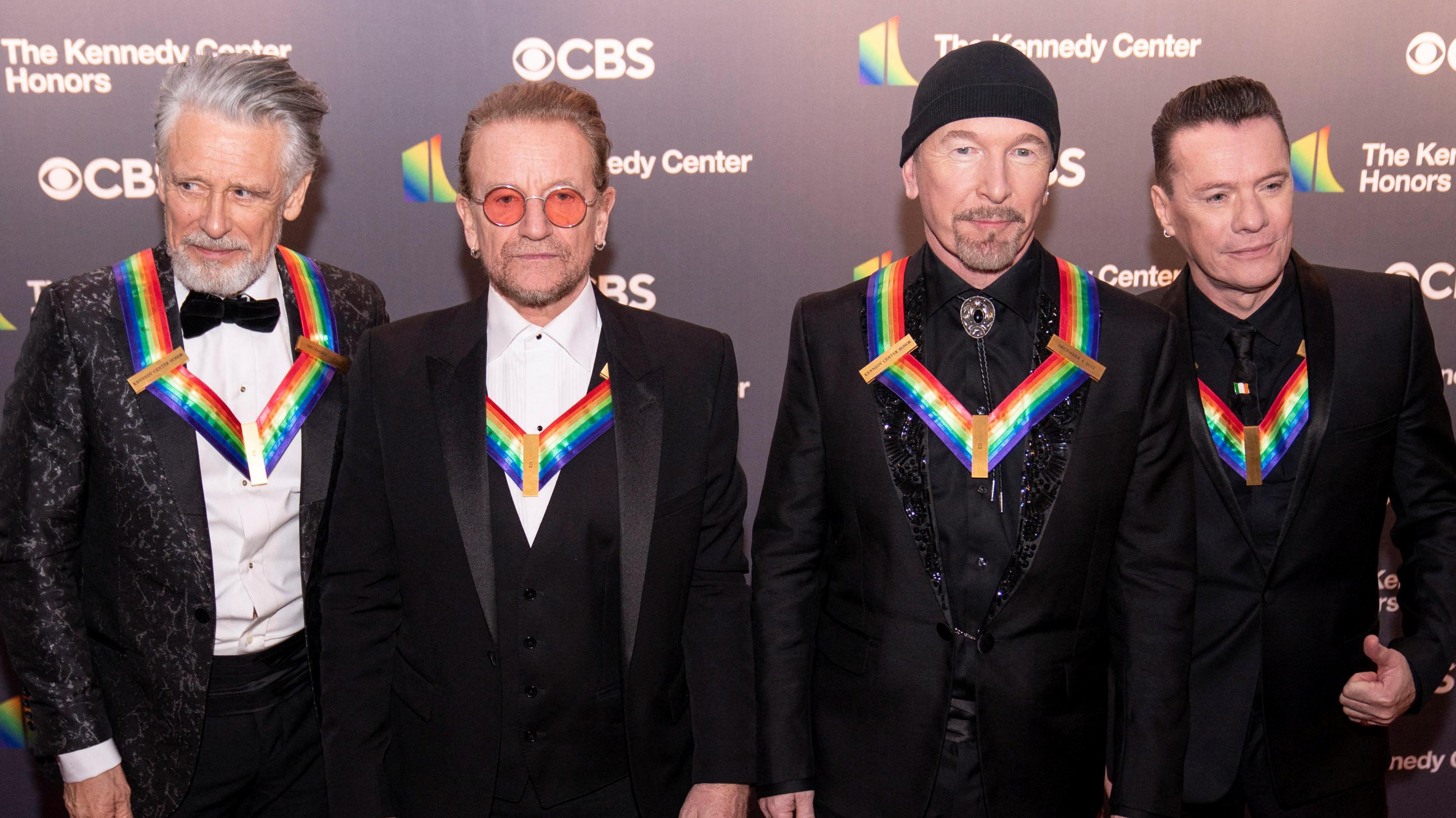 Kennedy Center honorees U2 band members Adam Clayton, Bono, The Edge, and Larry Mullen Jr., pose for a photo on the red carpet at the Kennedy Center honorees gala in Washington, D.C.