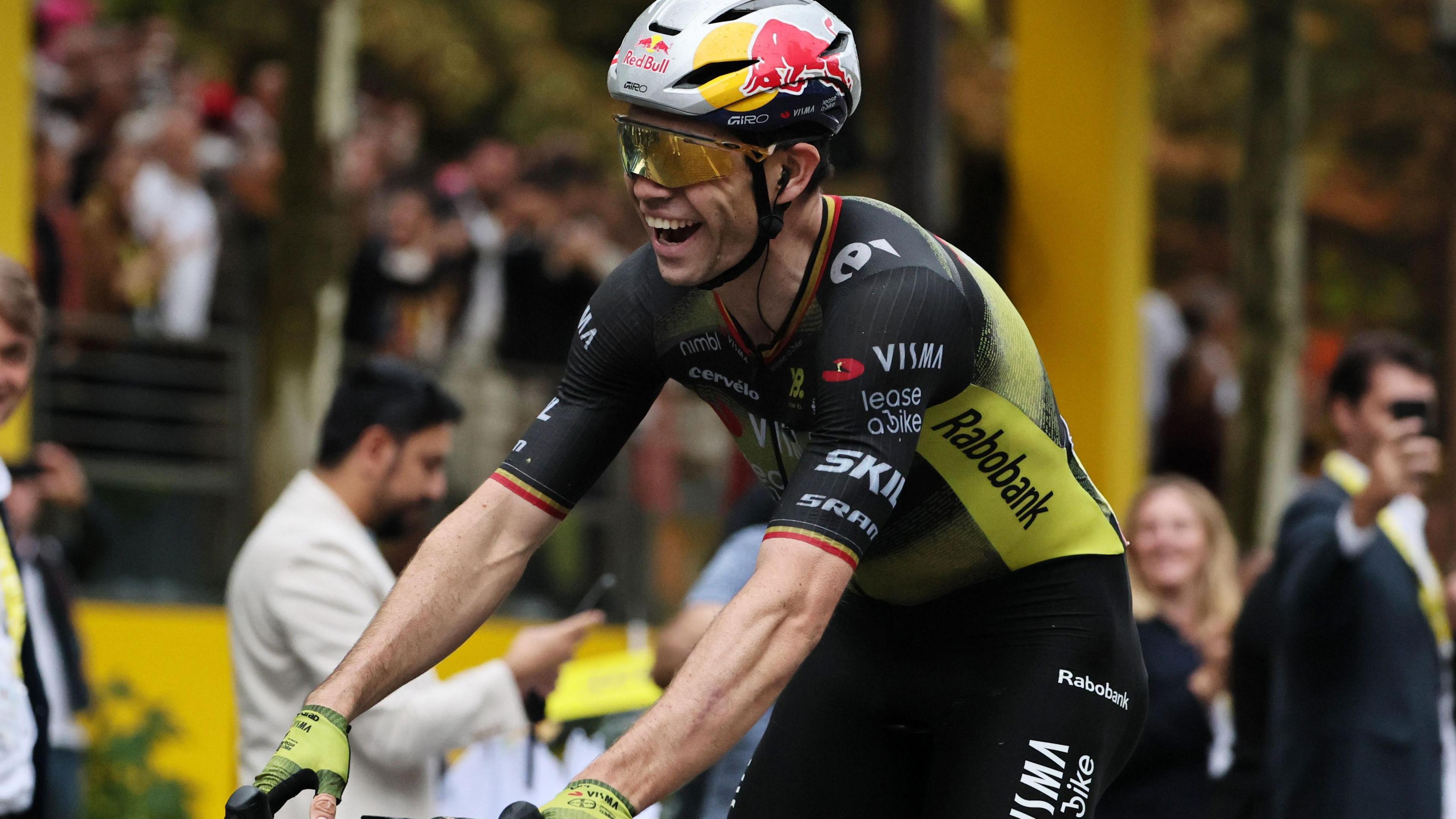 Wout van Aert smiles after winning the final stage of the 2025 Tour de France
