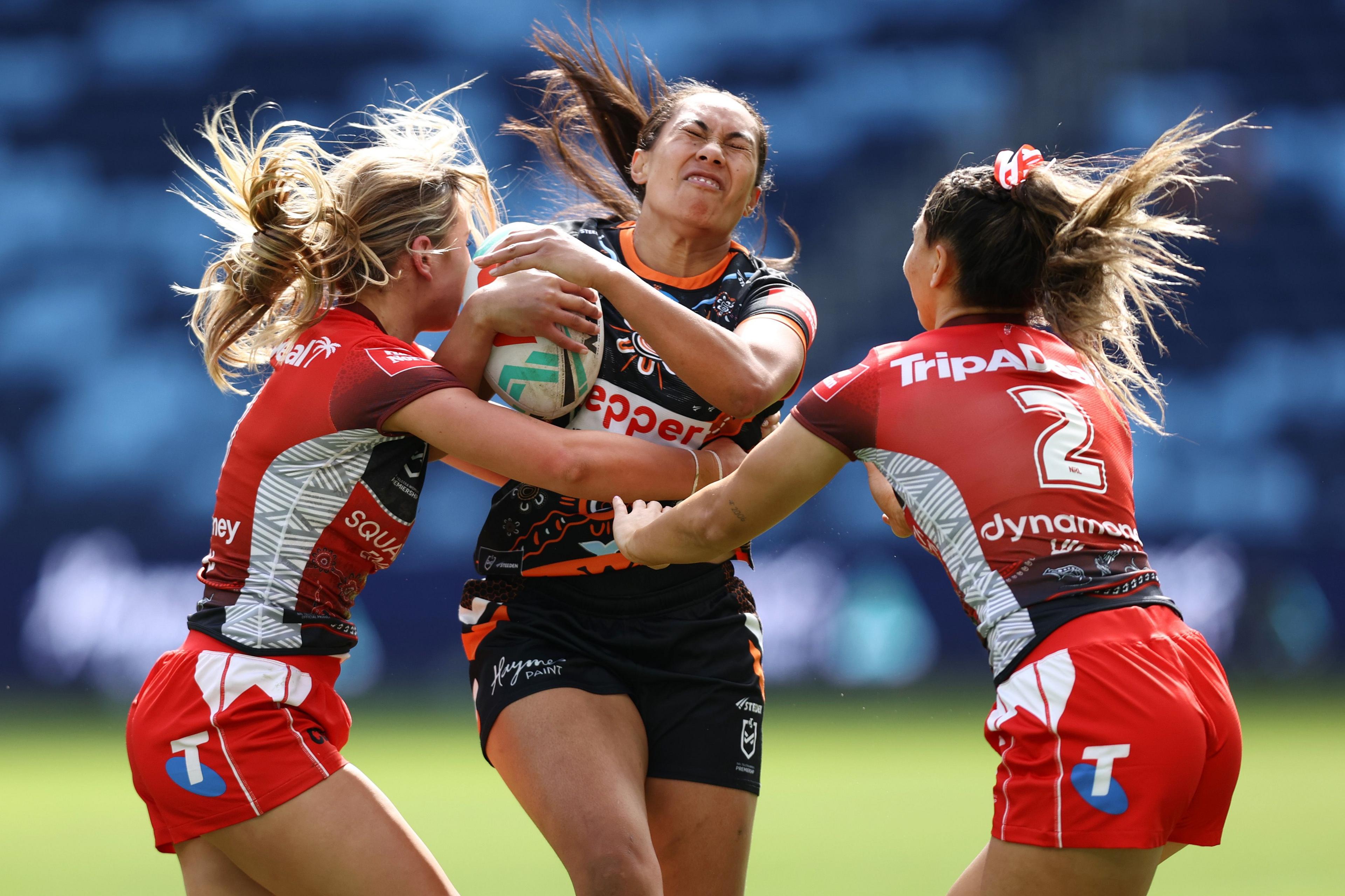 Wests Tigers' Amelia Huakau s tackled during the round seven NRLW match between Wests Tigers and St George Illawarra Dragons at Allianz Stadium in Sydney, Australia. Photo by Jason McCawley