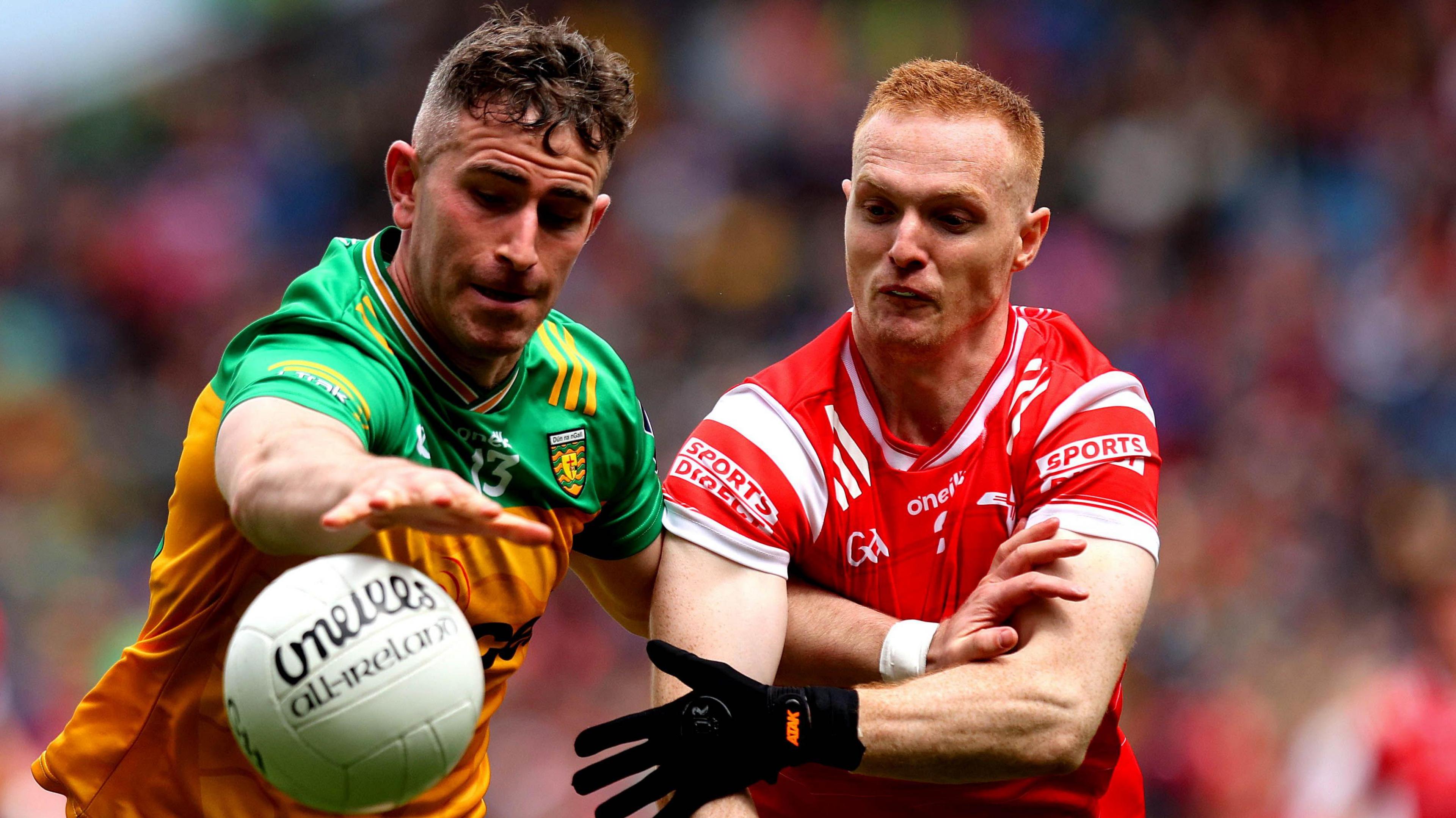 Donegal captain Patrick McBrearty challenges for the ball 