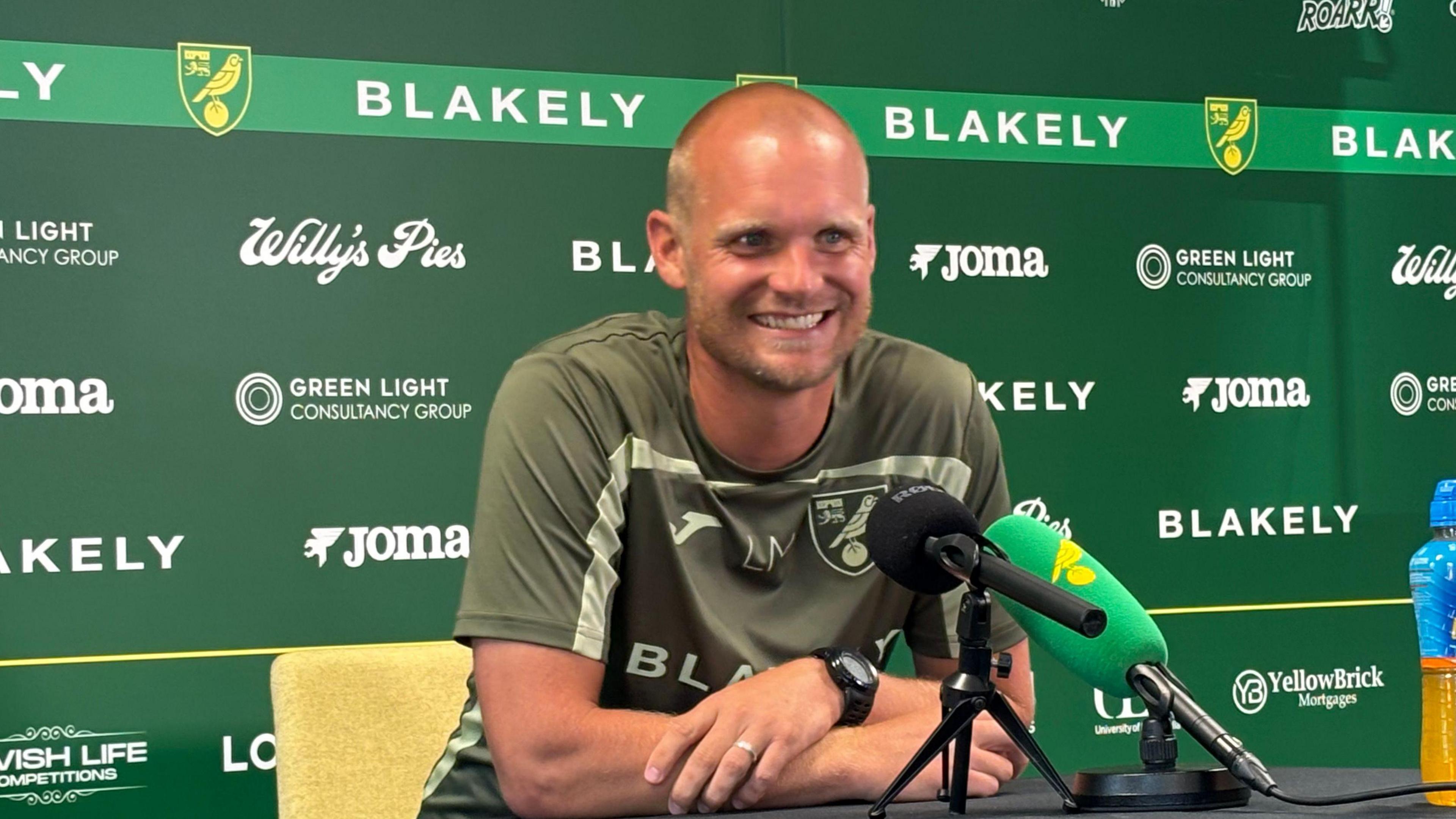 Liam Manning at press conference