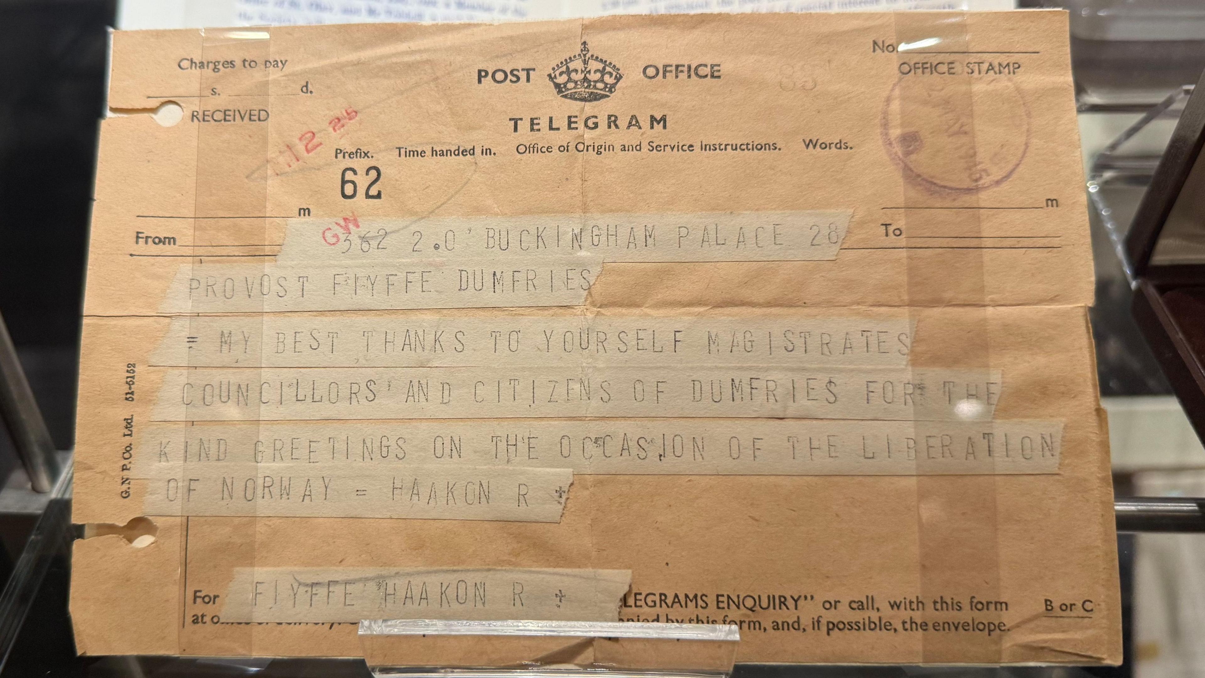 A telegram printed on dated parchment paper.
