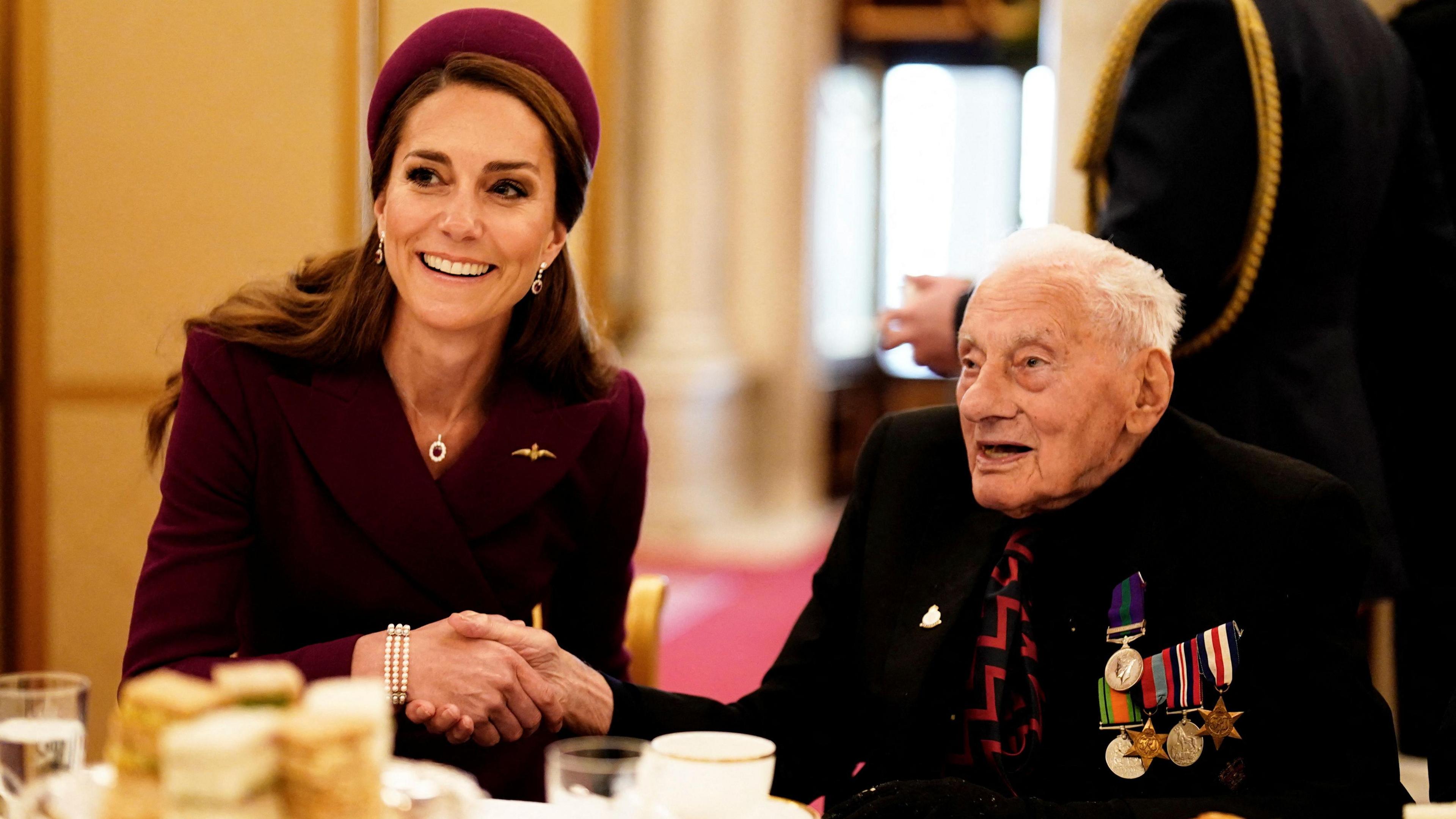 Britain's Princess of Wales joins Second World War veterans at a tea party in Buckingham Palace