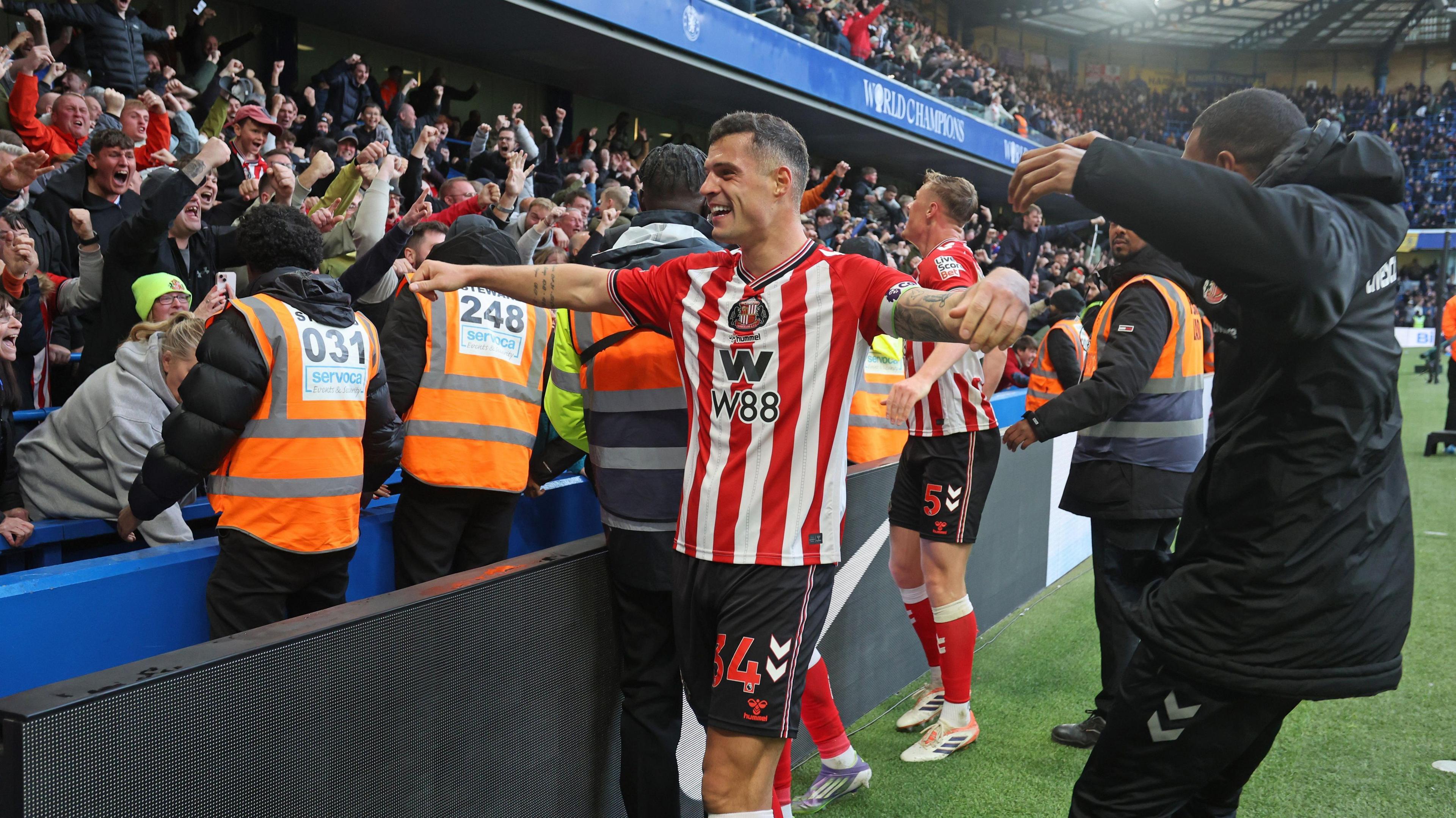 Granit Xhaka celebrates with Sunderland fans