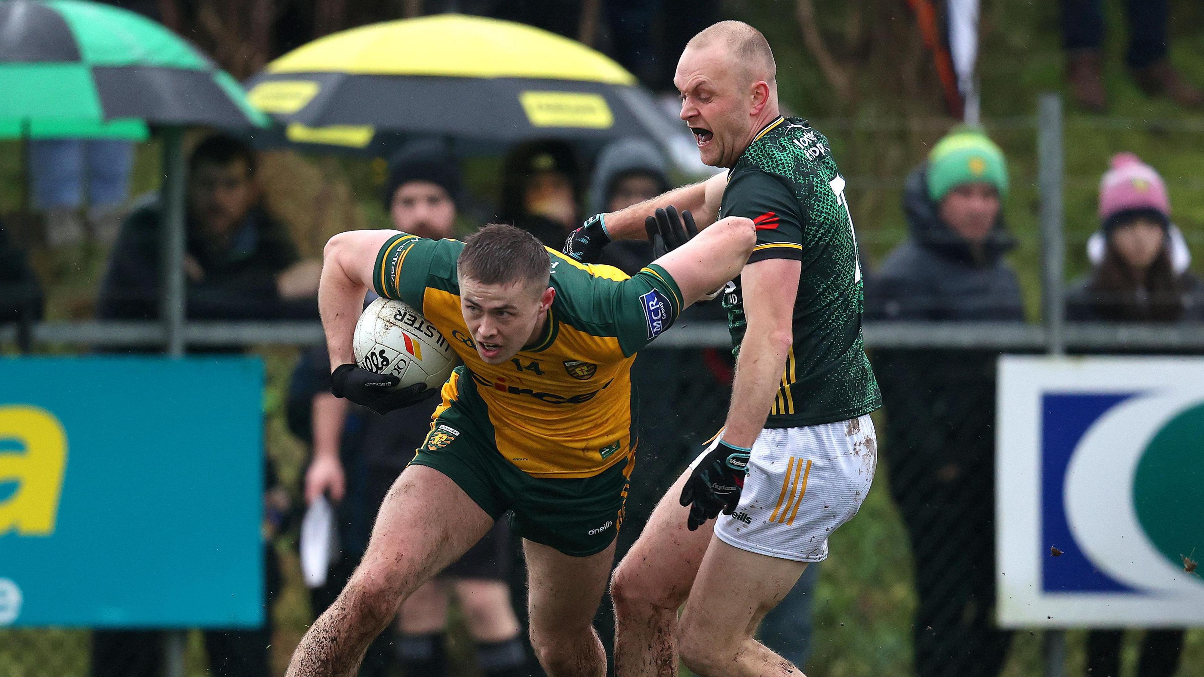 Donegal's Kieran Gallagher is challenged by Marc Jordan 
