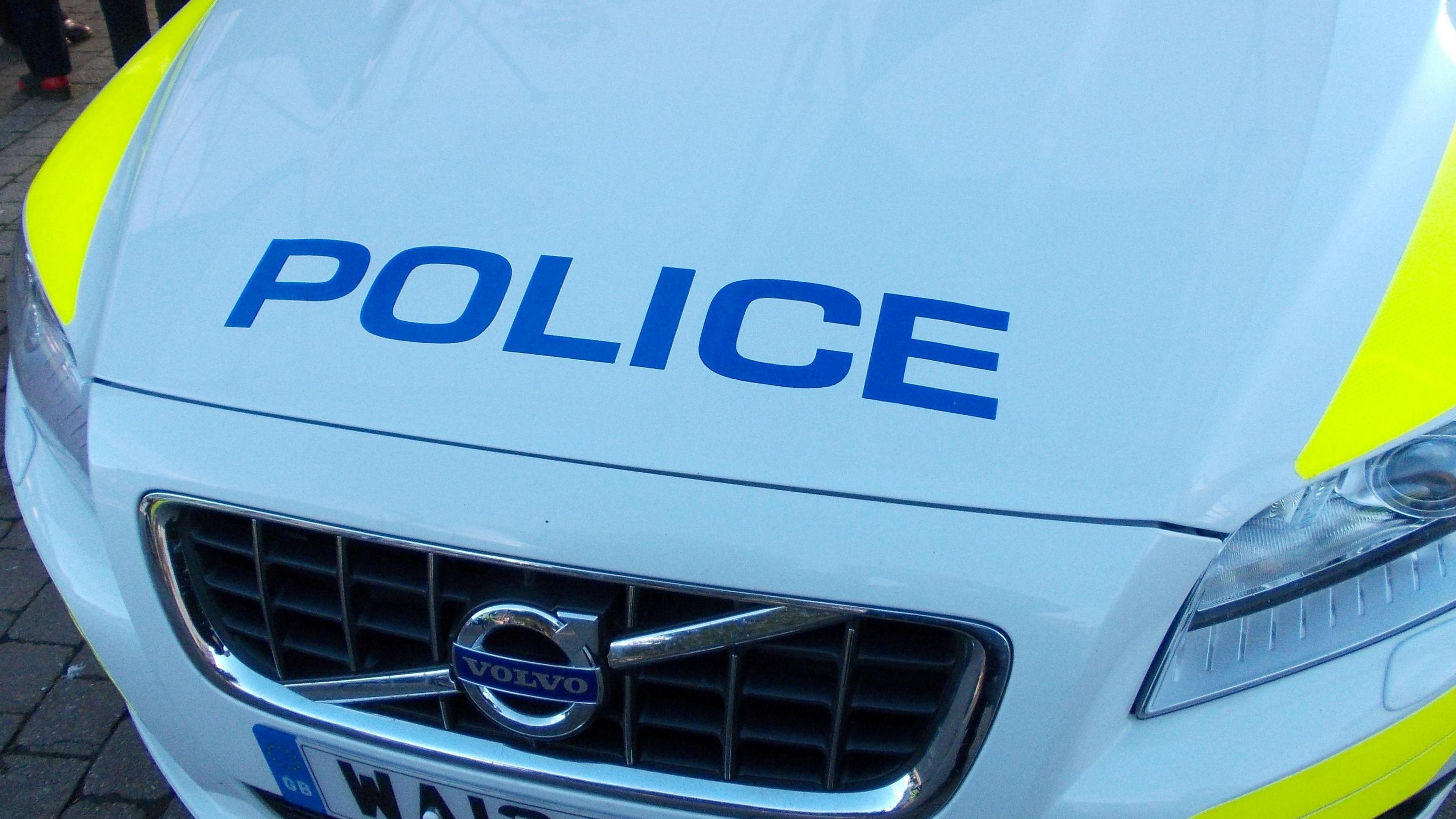 A Devon and Cornwall Police car bonnet, with the word "police" on it