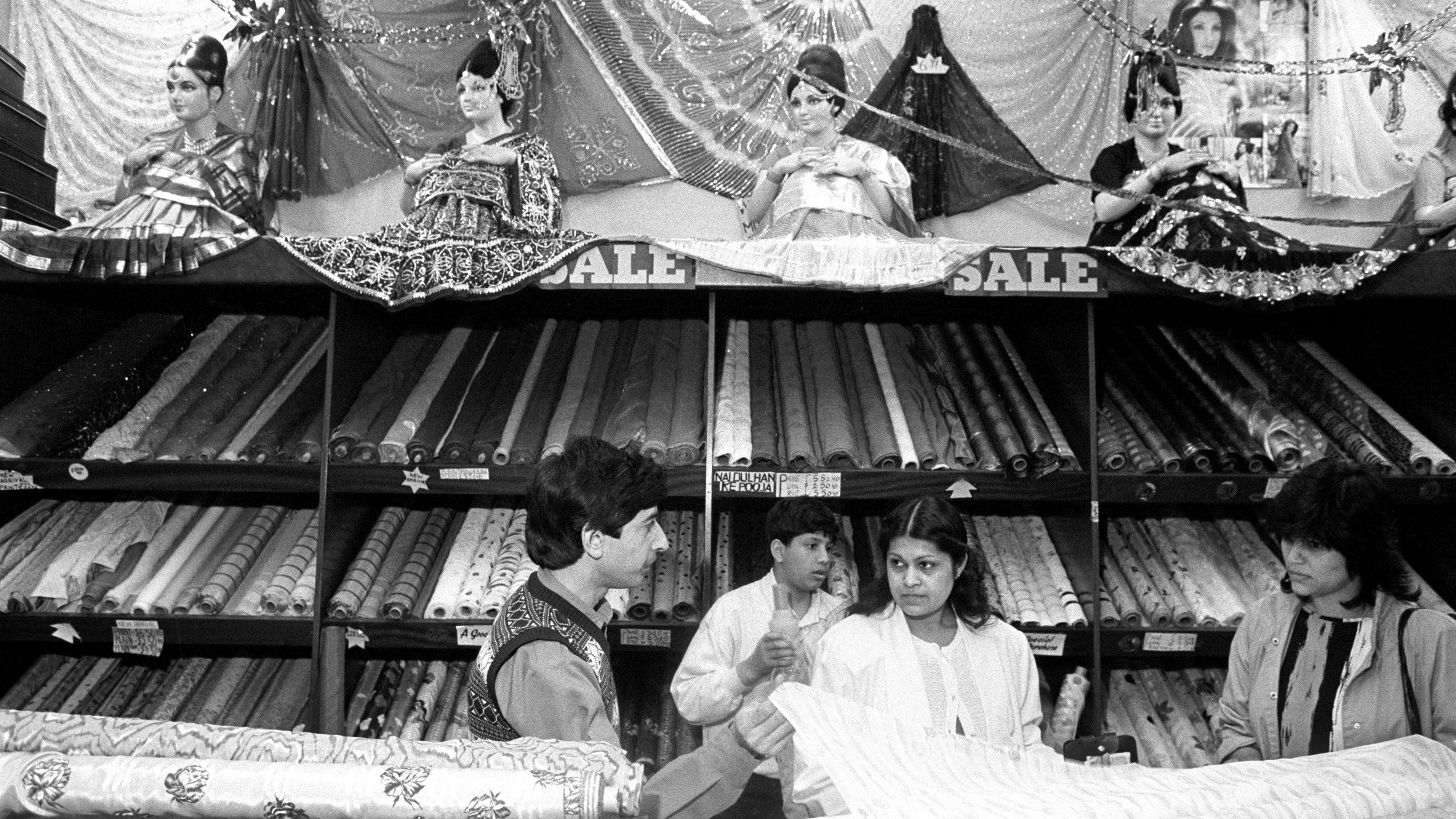 Black and white photograph of Bombay Stores, a well-known Asian store in Bradford, selling textiles since the 1950s.