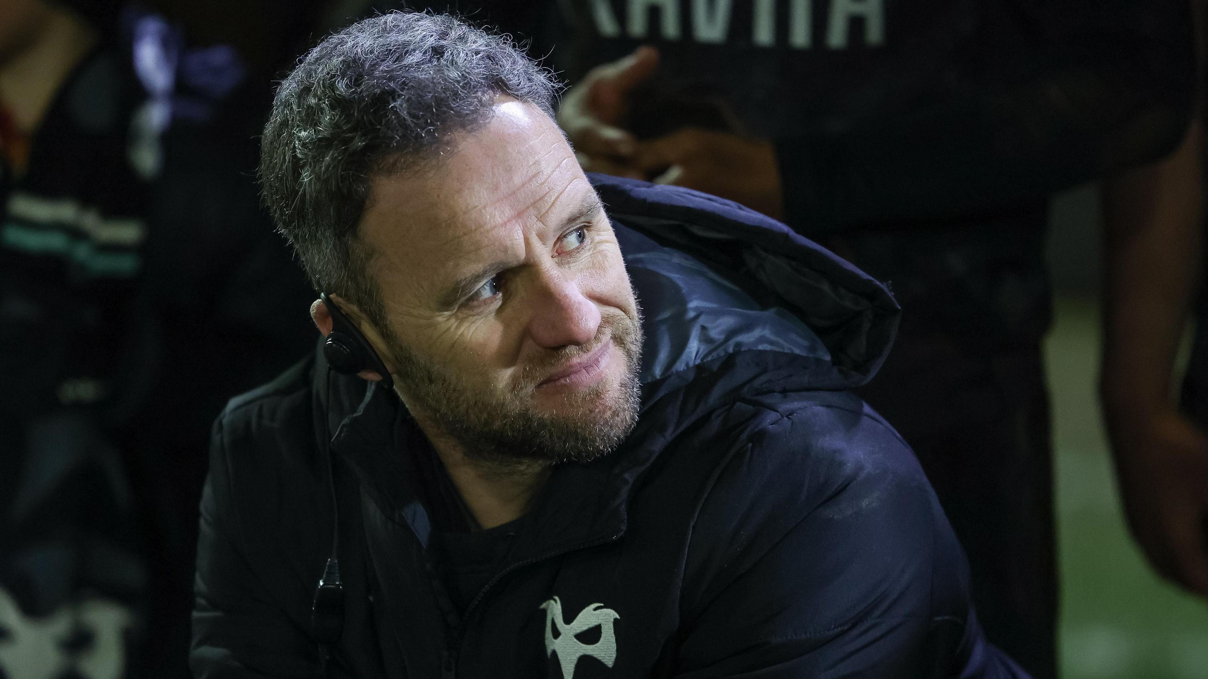 Mark Jones watches a game earlier this month