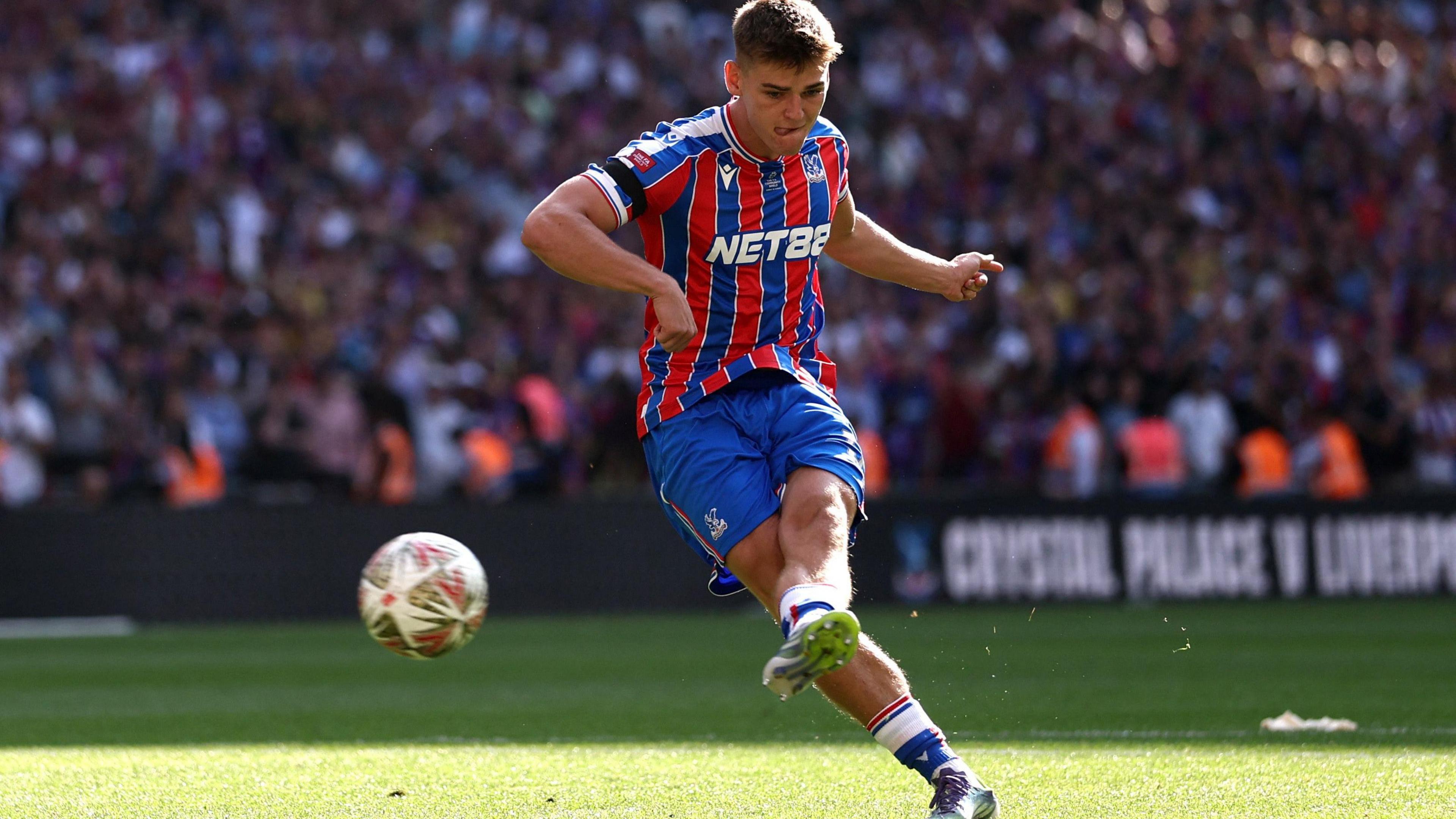 Justin Devenny scores his penalty in the shootout that decided last weekend's Community Shield