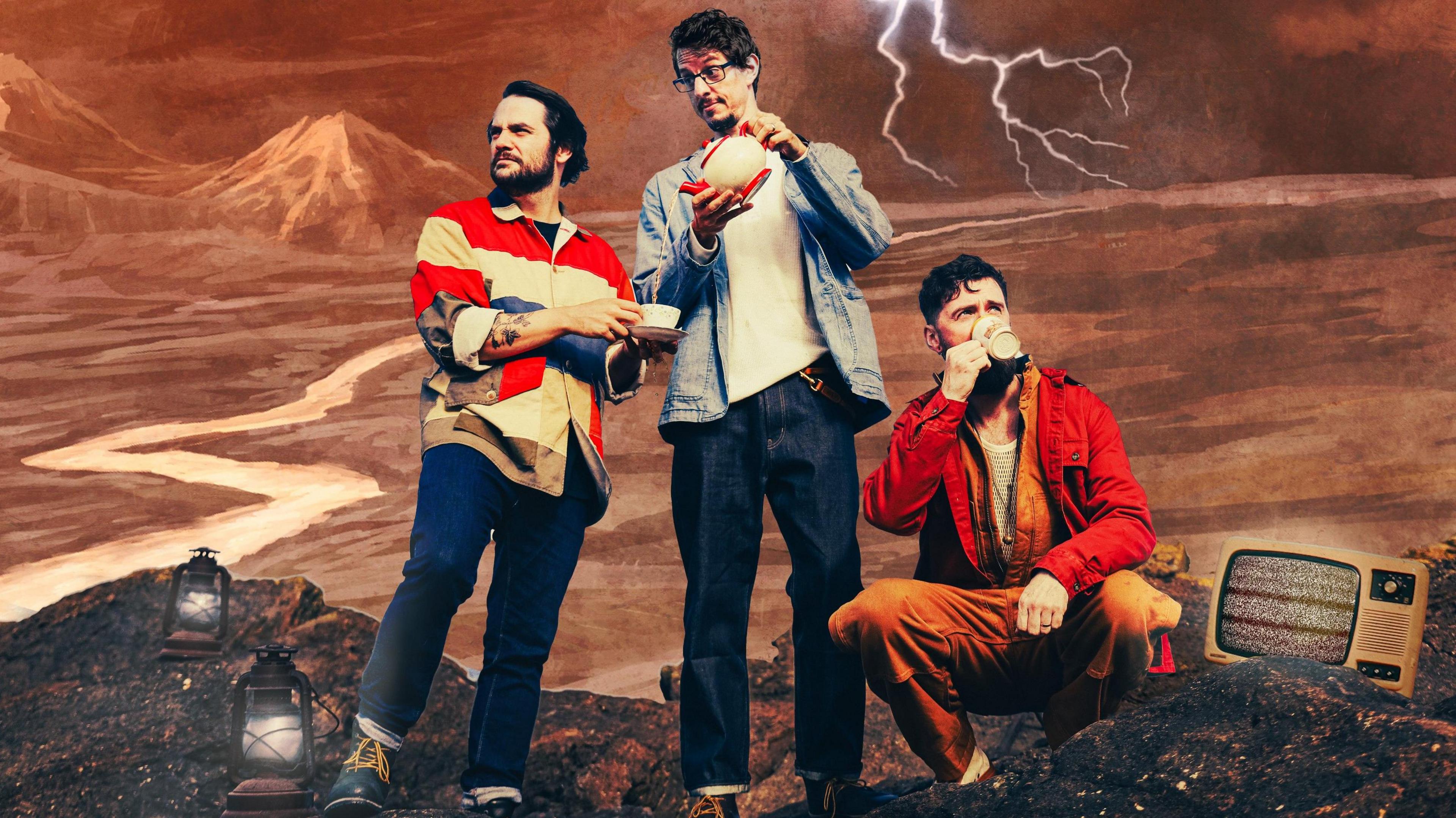 The trio, who look fashionably dressed for a pleasant walk, stand in a stylised setting, with a barren land behind them, and a mountain in the distance. A fork of lightning strikes above them. On the soil and rock-covered ground are two lamps, and a retro-looking television showing static on the screen. 