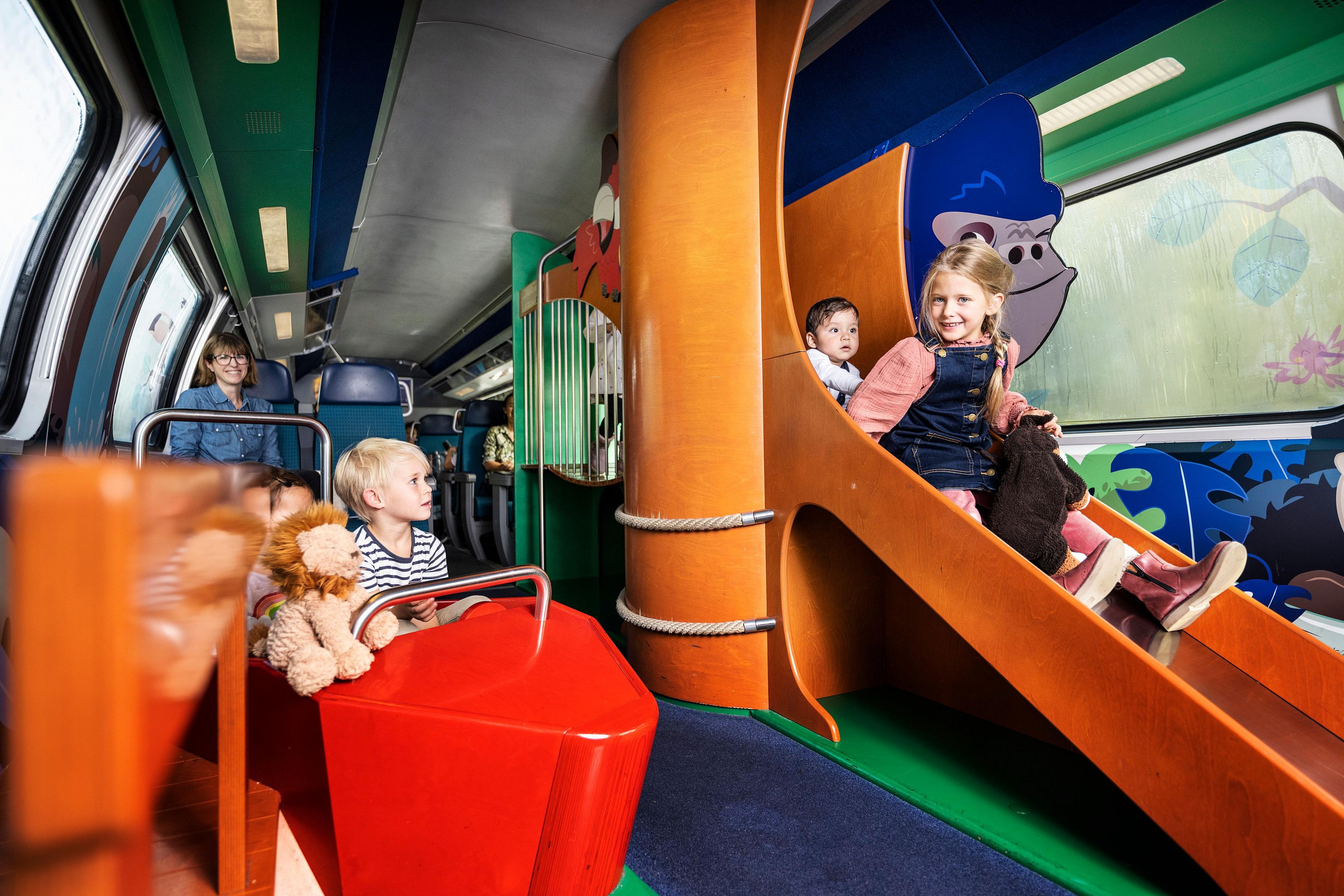 A play area on a Swiss train complete with slide