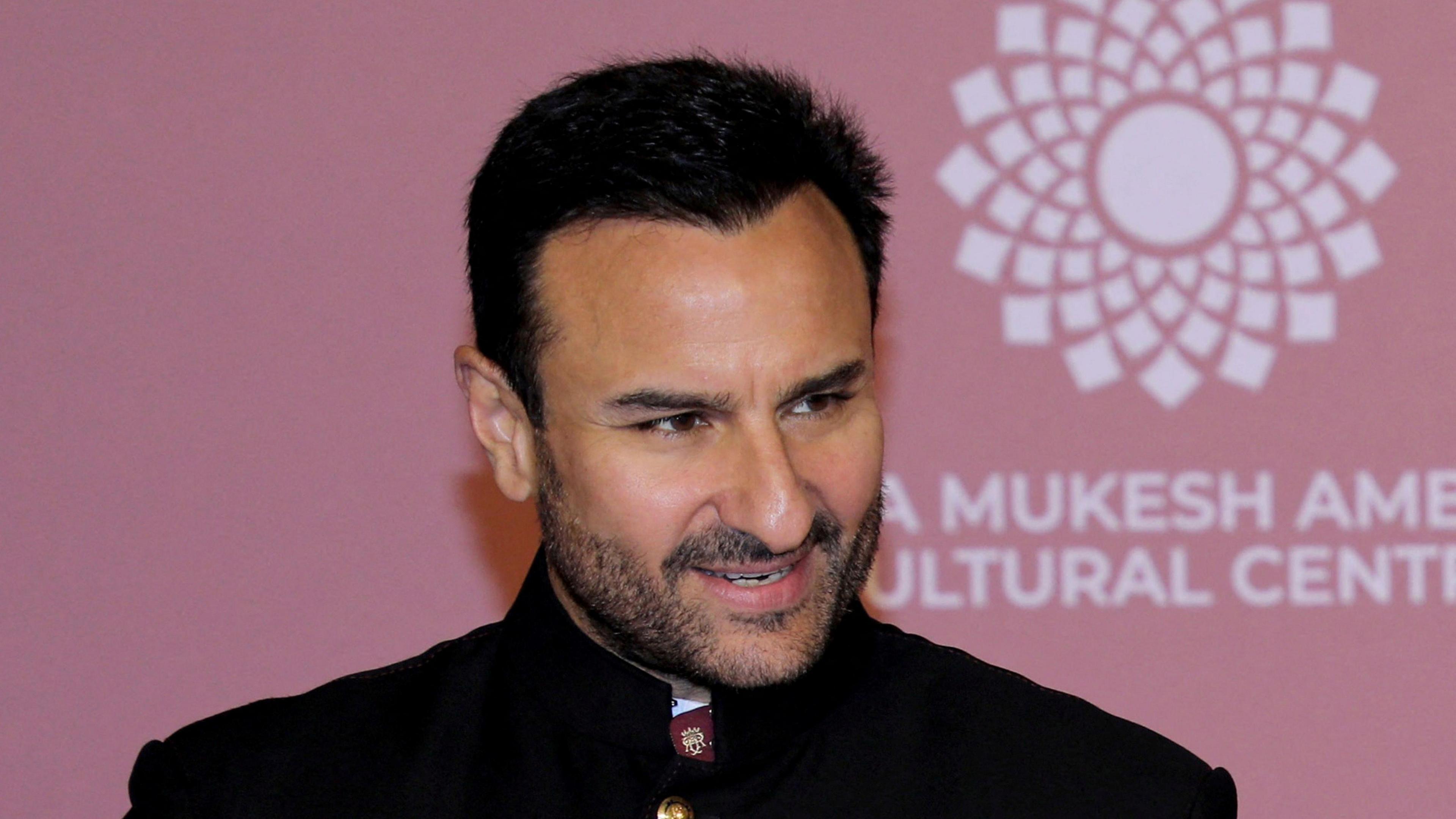 Bollywood actor Saif Ali Khan wearing a black jacket and a white shirt poses on the red carpet during the second day of the opening of Nita Mukesh Ambani Cultural Centre (NMACC) at Jio World Centre, in Mumbai, India, April 1, 2023.