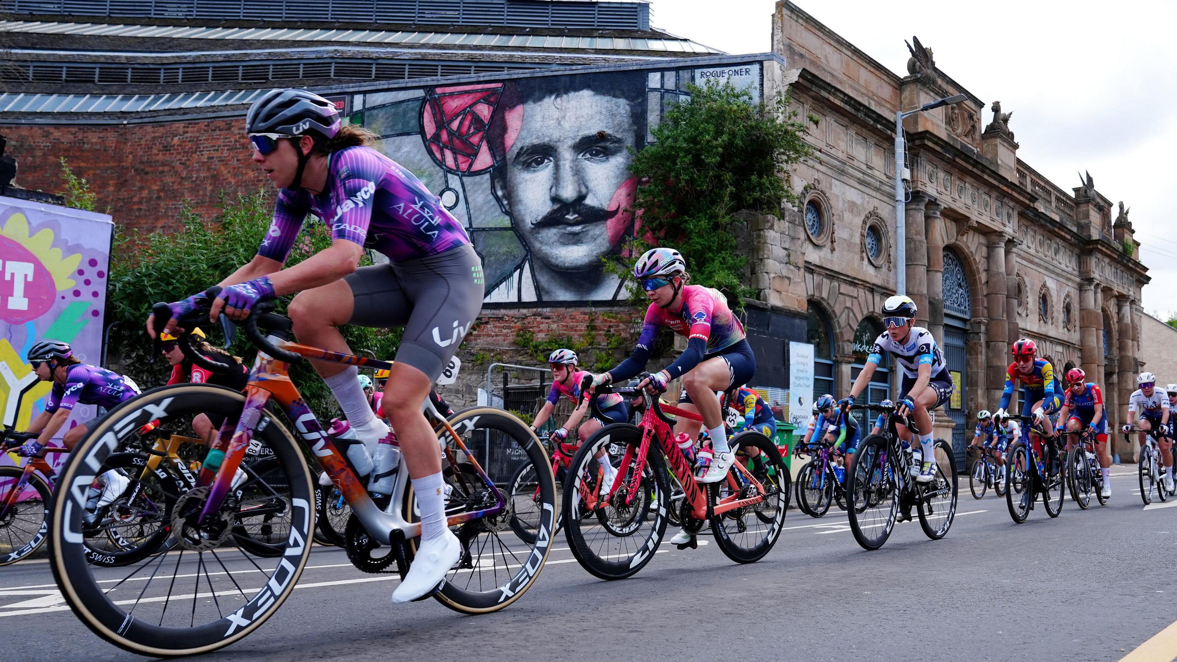Among the landmarks the cyclists passed was a mural honouring architect Charles Rennie Mackintosh